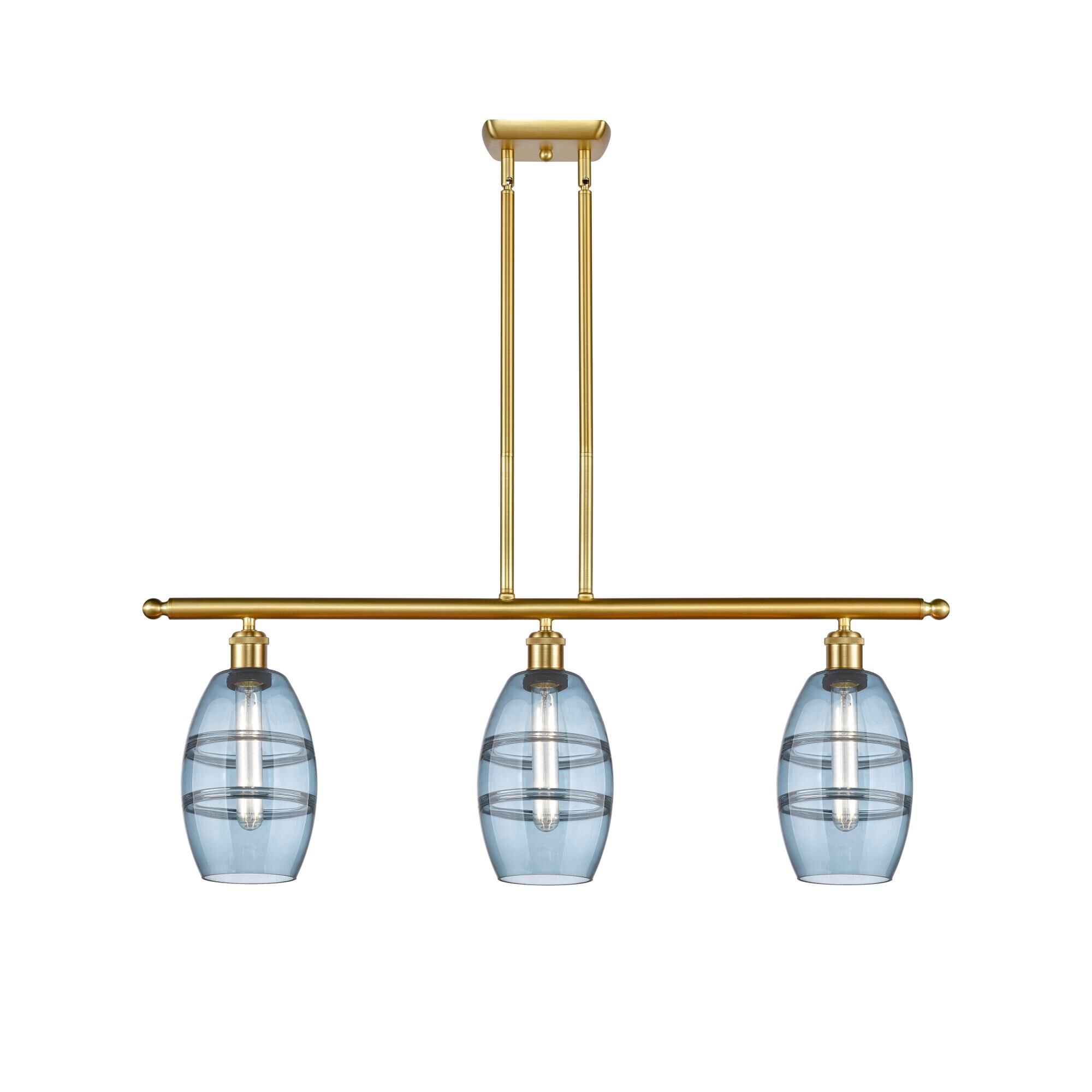 Shown in Satin Gold finish and Princess Blue glass