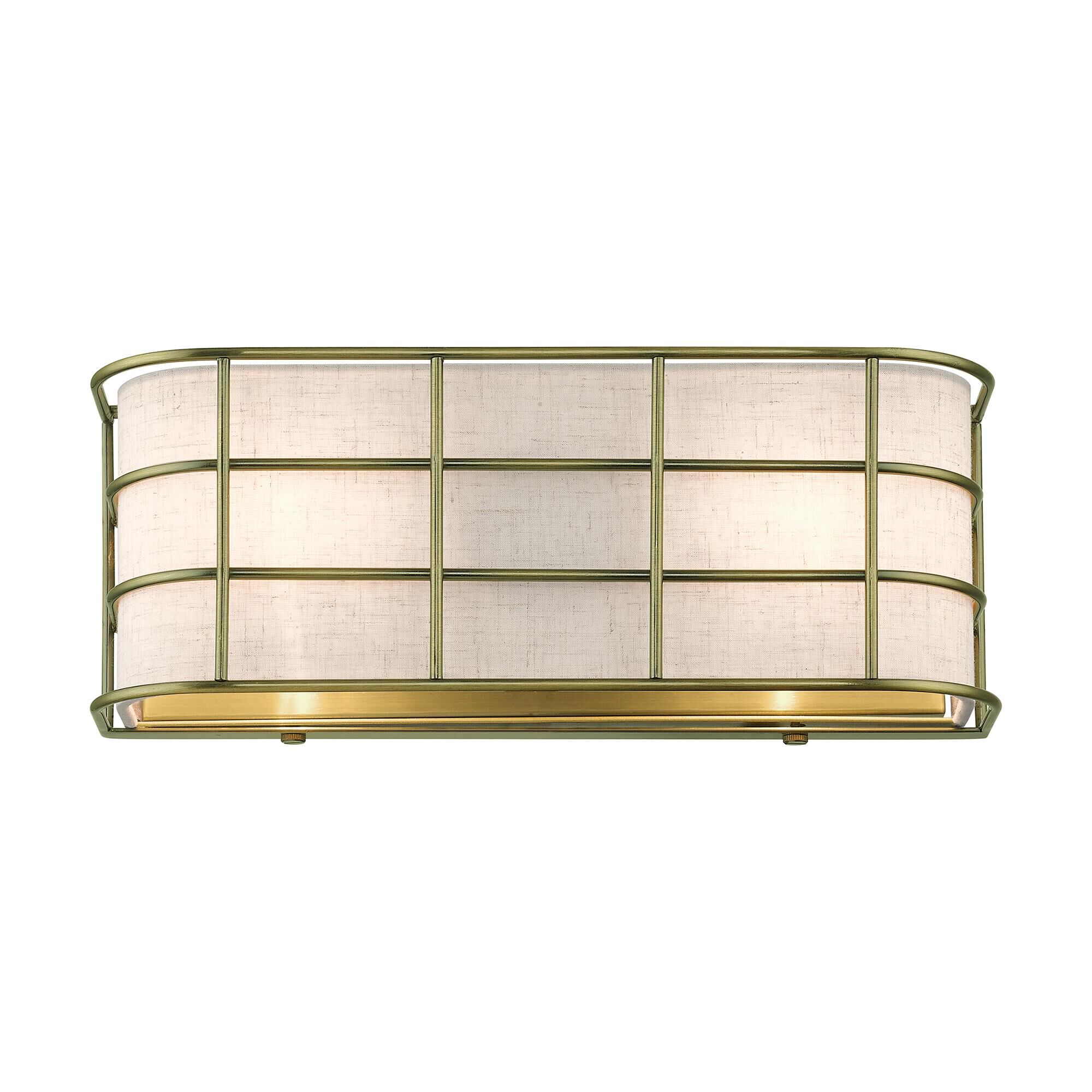 Shown in Antique Brass finish and Hand Crafted Oatmeal Color Hardback Fabric shade