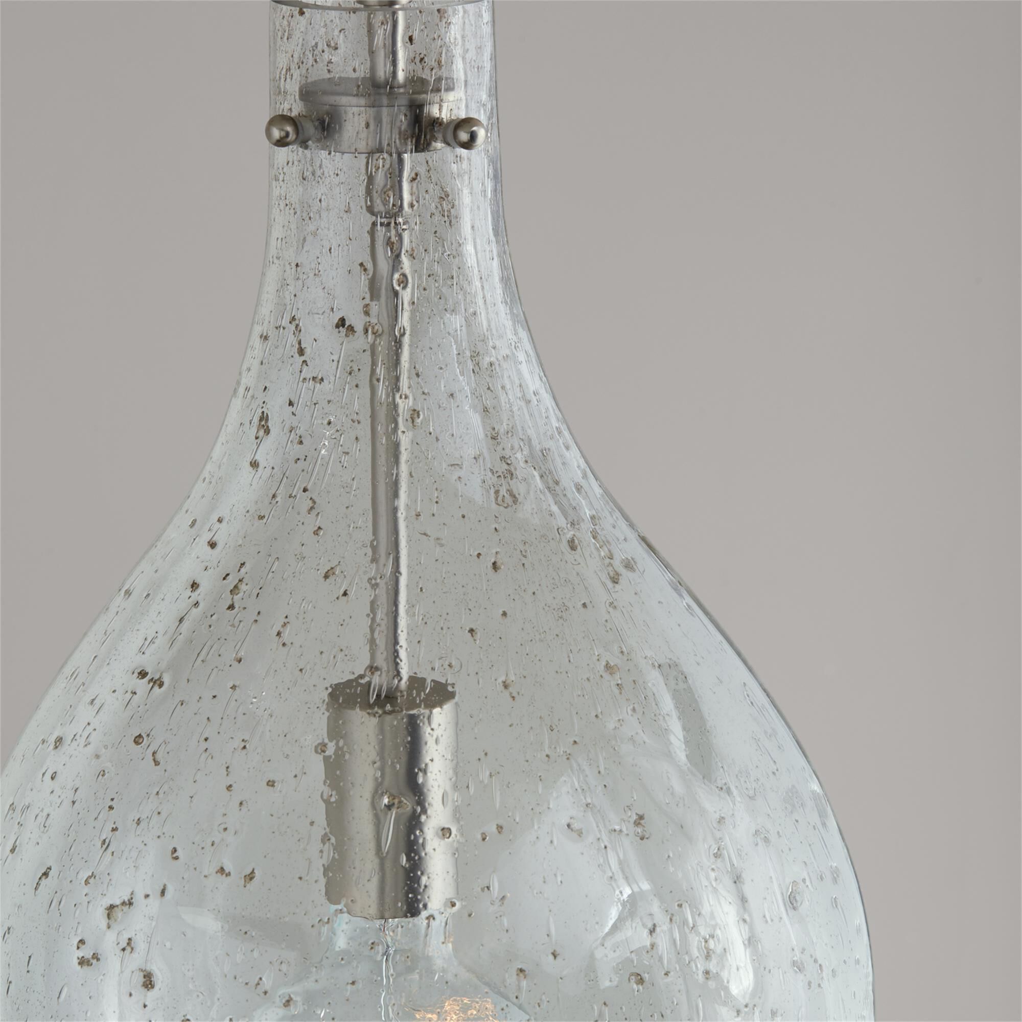 Shown in Brushed Nickel finish and Stone Seeded glass