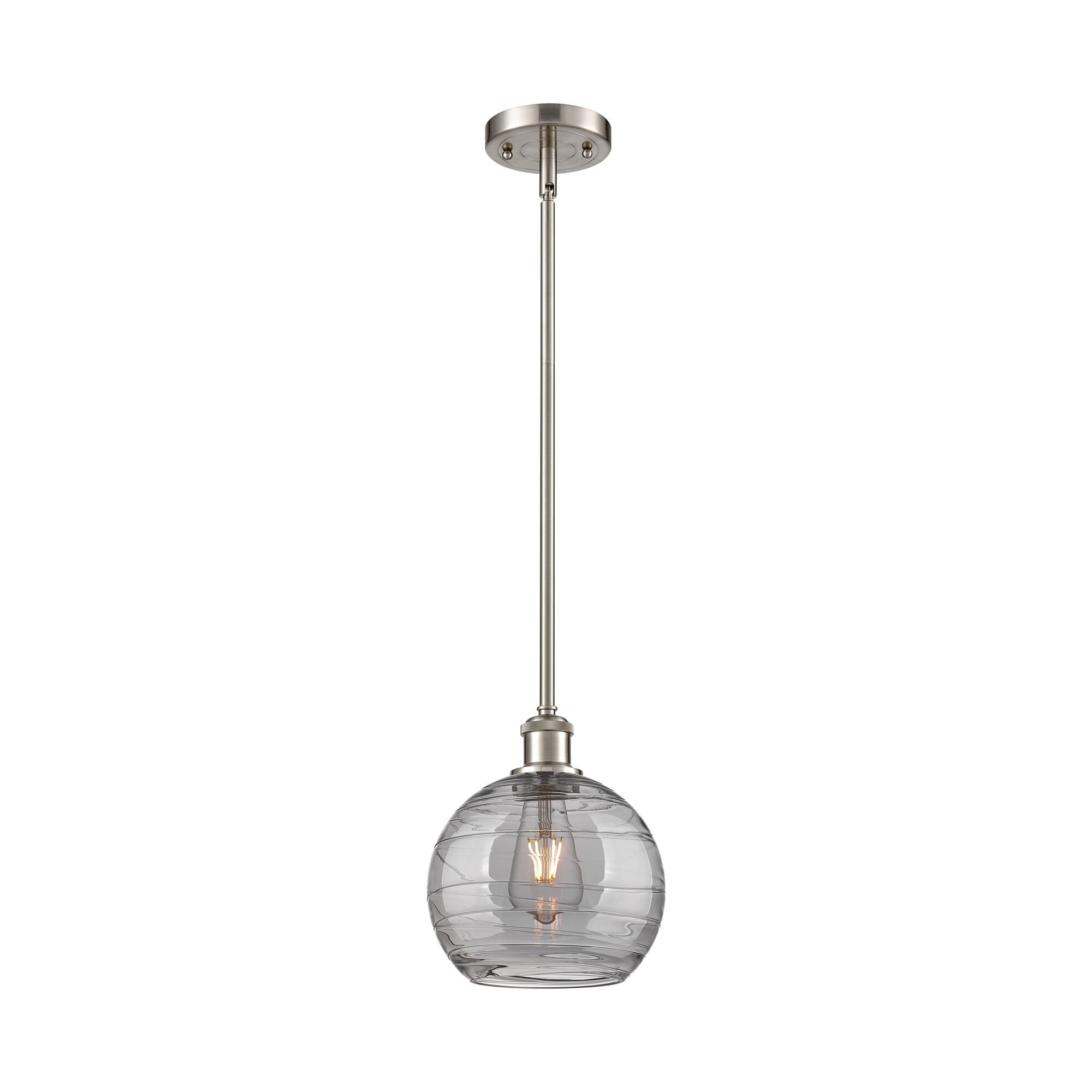 Shown in Brushed Satin Nickel finish and Light Smoke Deco Swirl glass