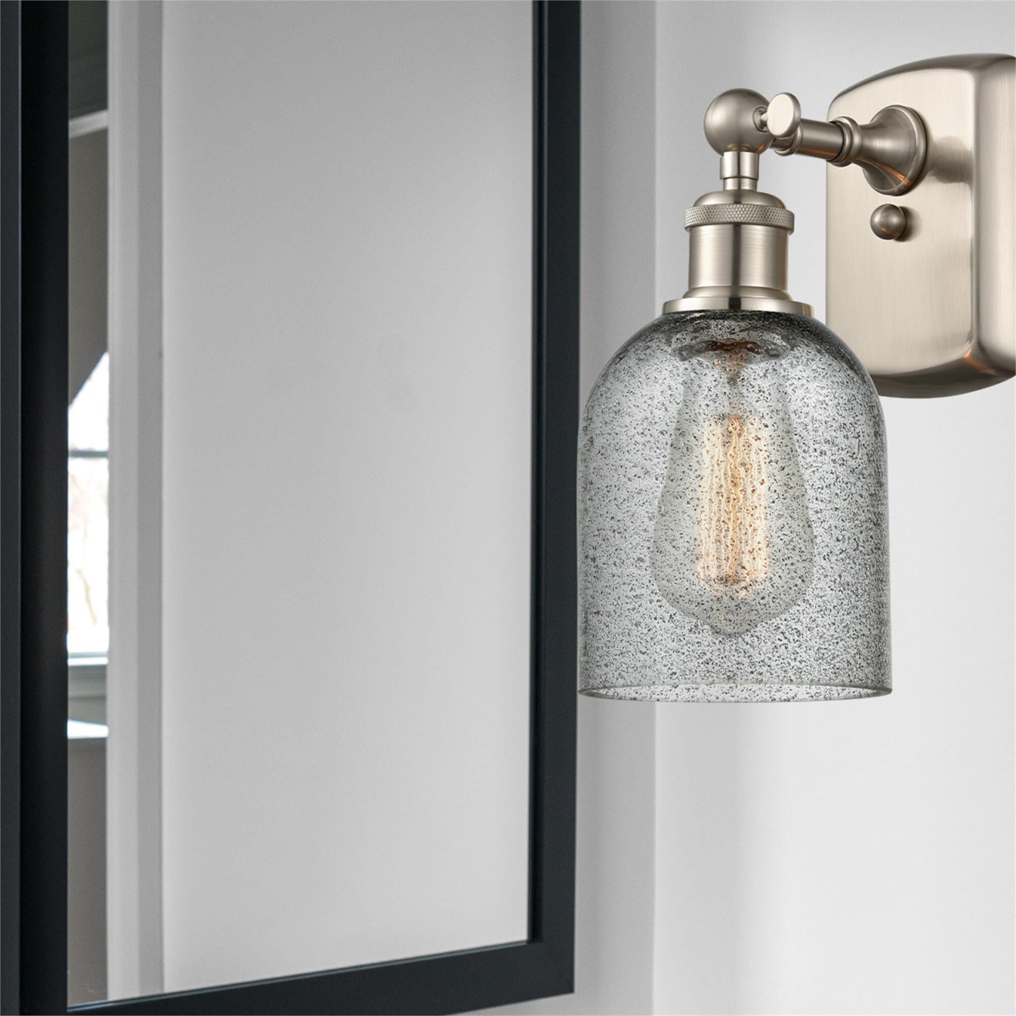 Shown in Brushed Satin Nickel finish and Charcoal glass