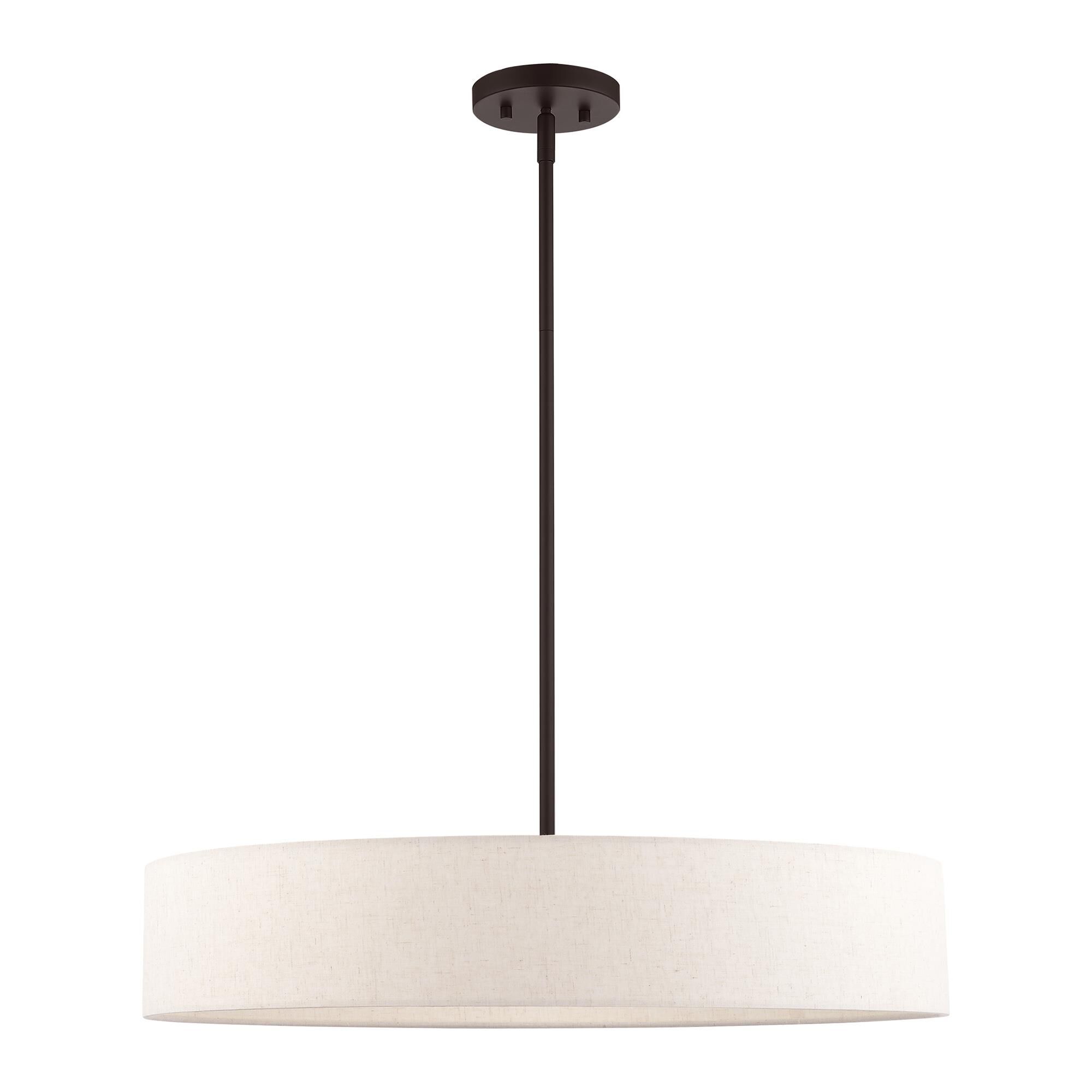 Shown in Bronze With Antique Brass Accents finish and Hand Crafted Oatmeal Fabric Hardback Shade glass and Hand Crafted Oatmeal Fabric Hardback shade