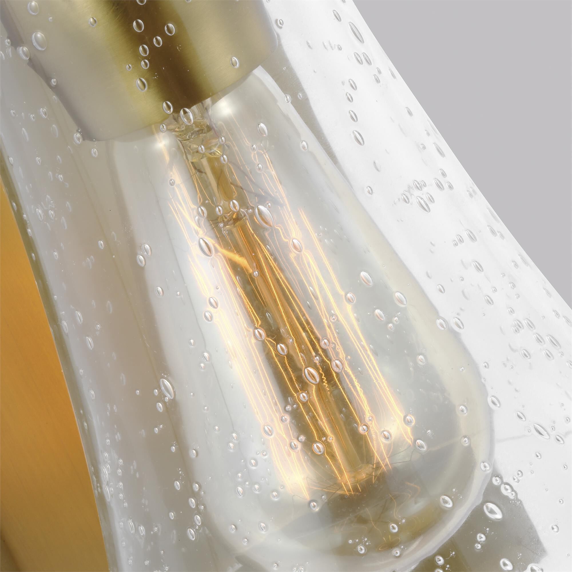 Shown in Burnished Brass finish and Clear Seeded glass