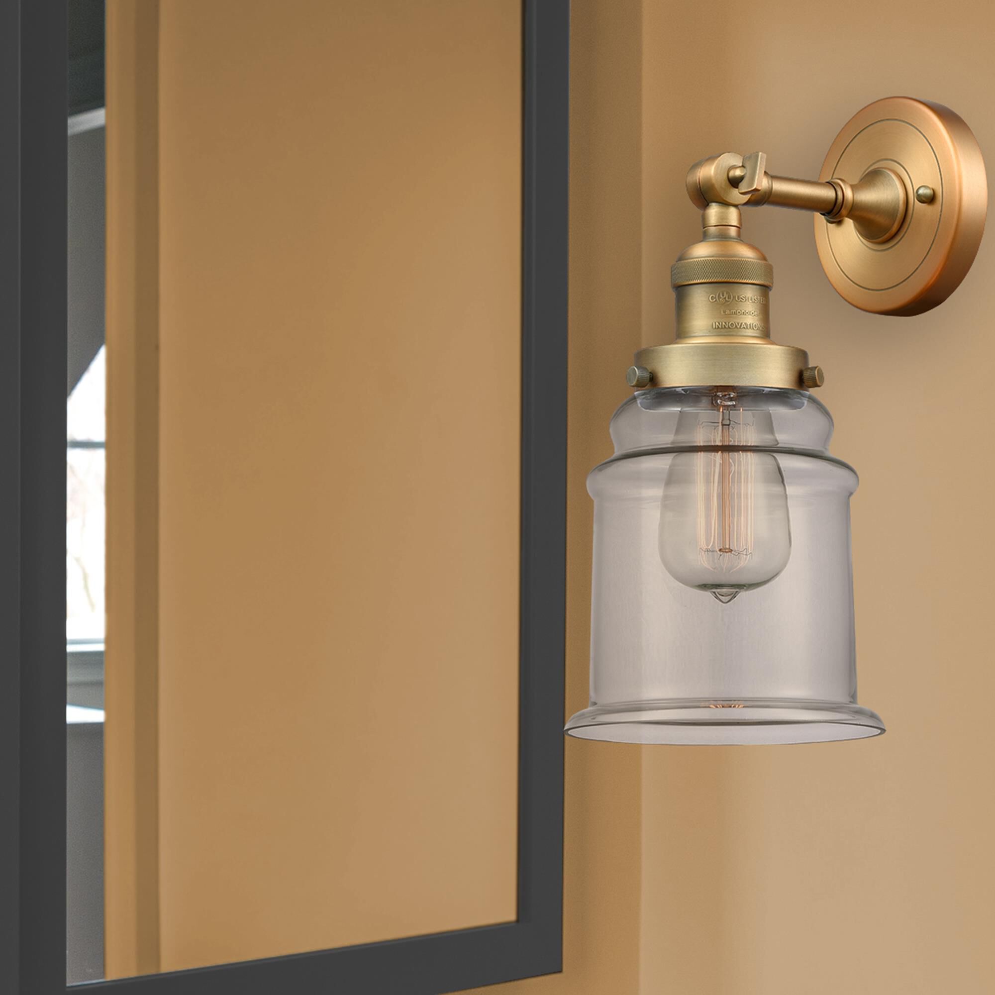 Shown in Brushed Brass finish and Clear glass