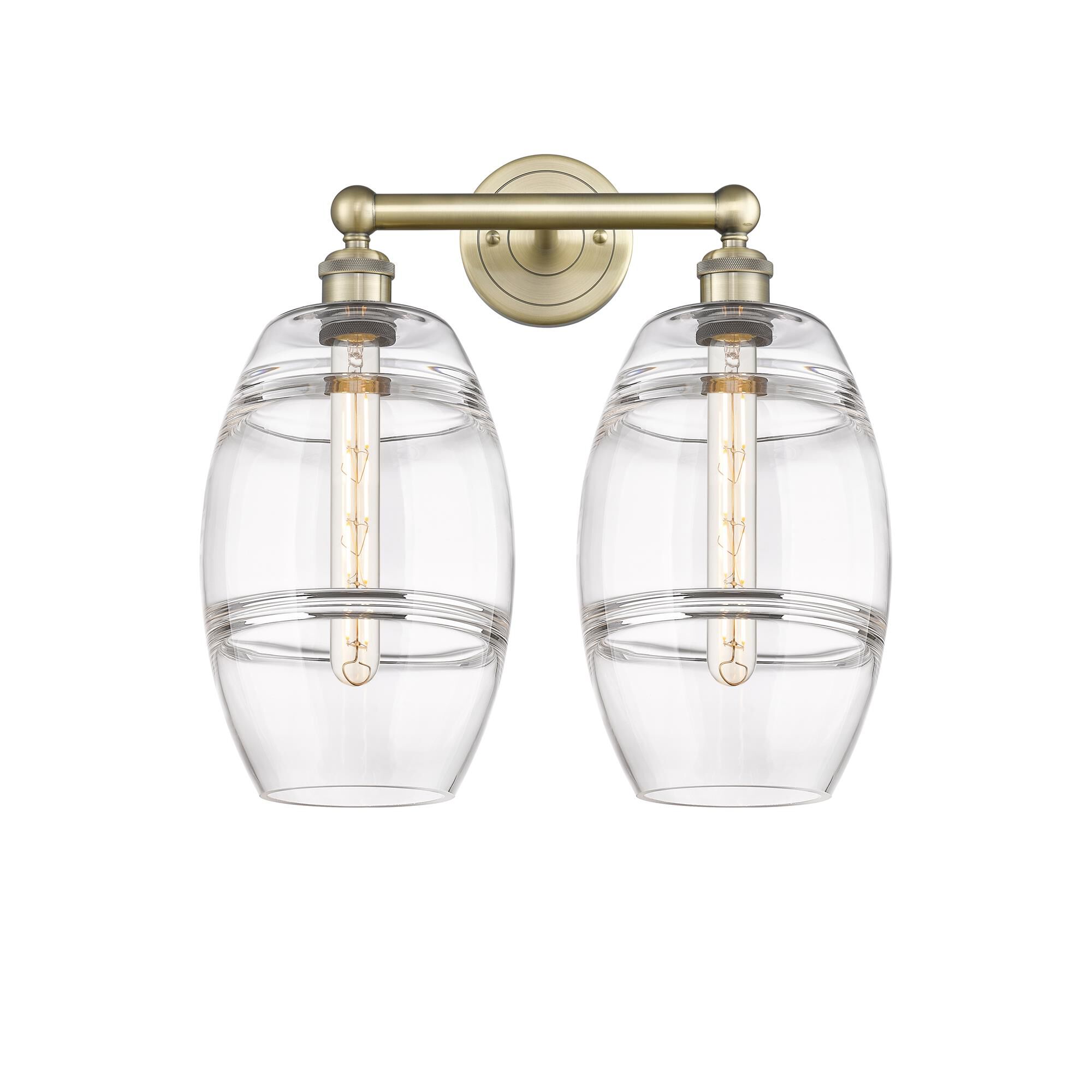 Shown in Antique Brass finish and Clear glass