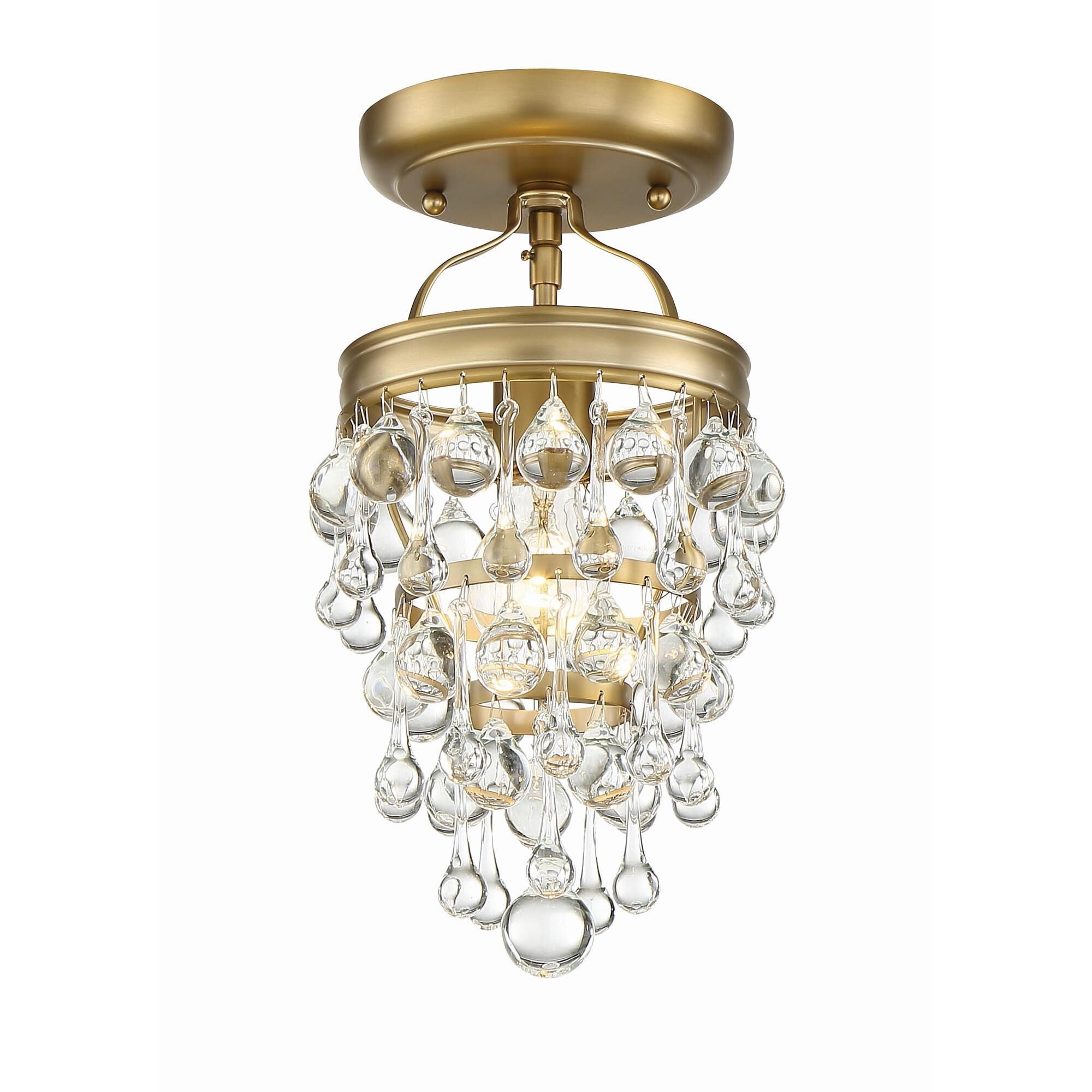 Shown in Vibrant Gold finish and Clear Glass Drops crystal