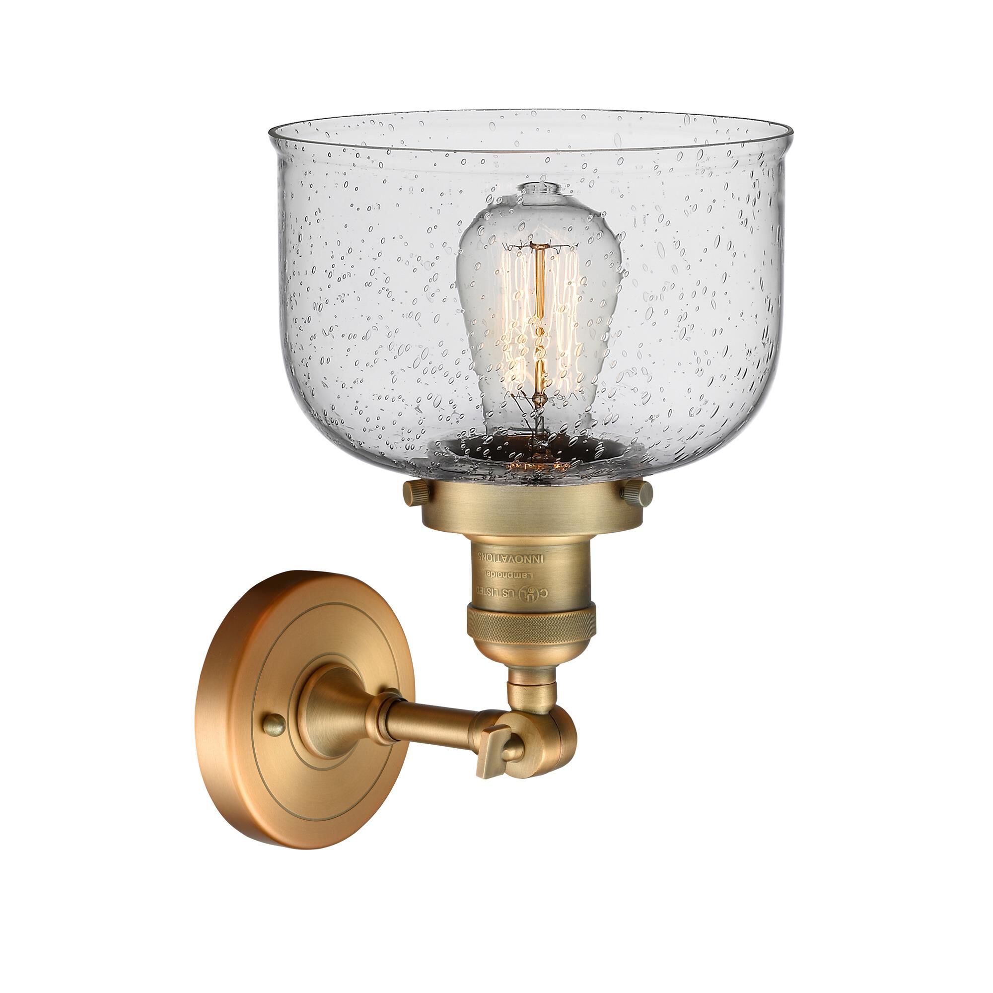 Shown in Brushed Brass finish and Seedy glass