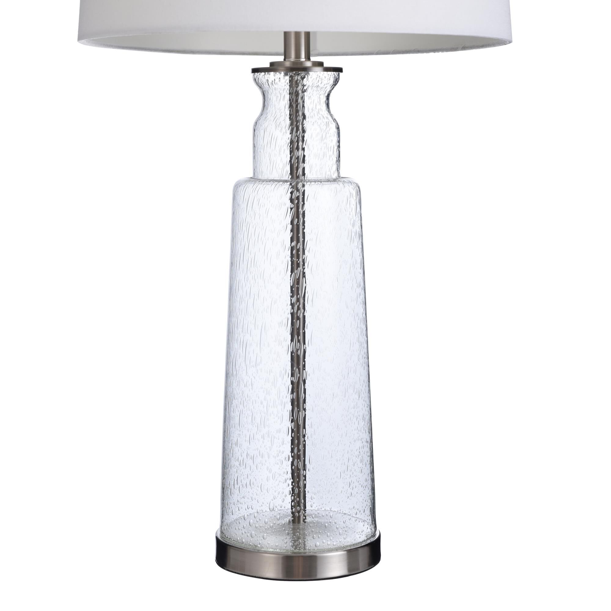Shown in Clear Seeded With Brass Steel finish and White Hardback Fabric shade