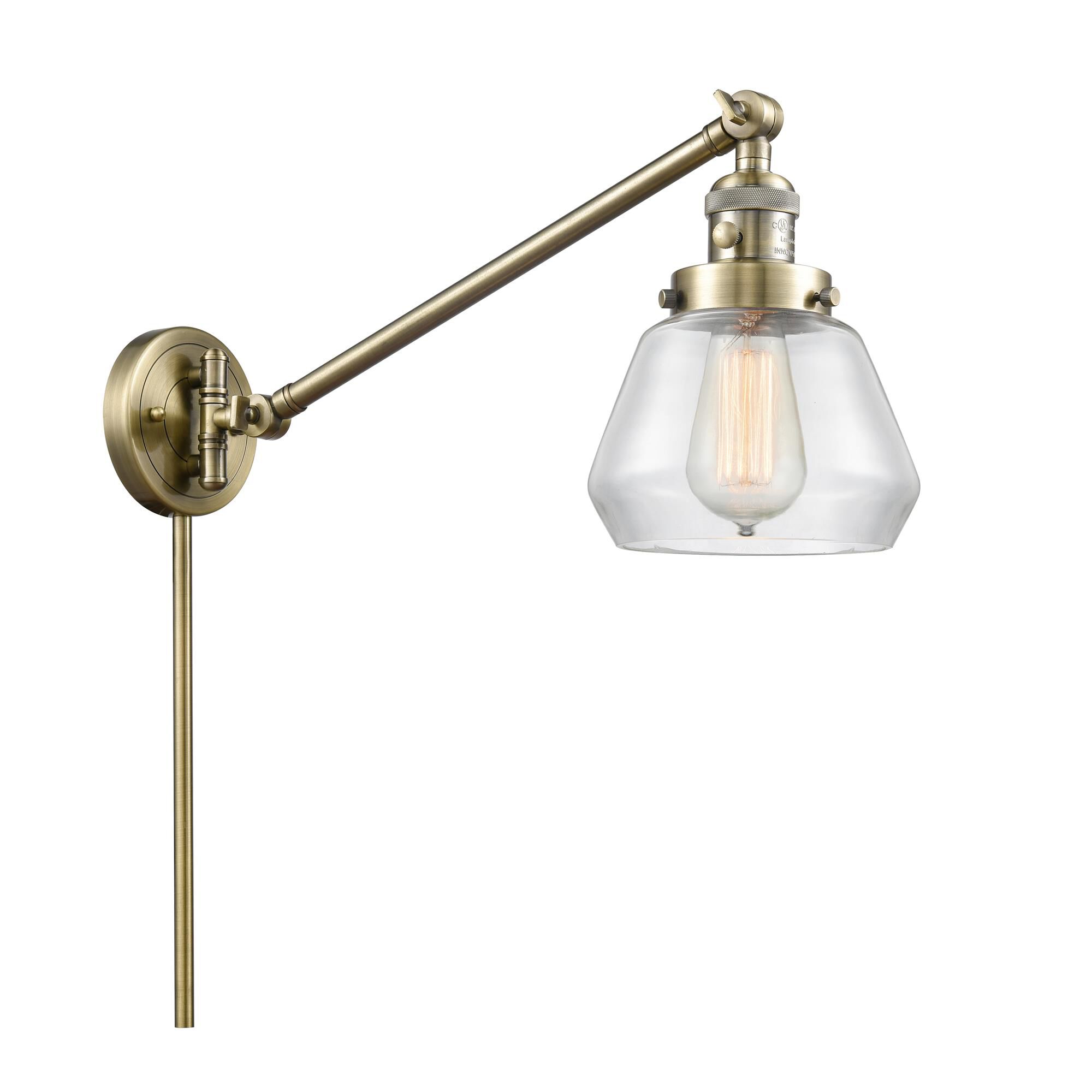 Shown in Antique Brass finish and Clear glass