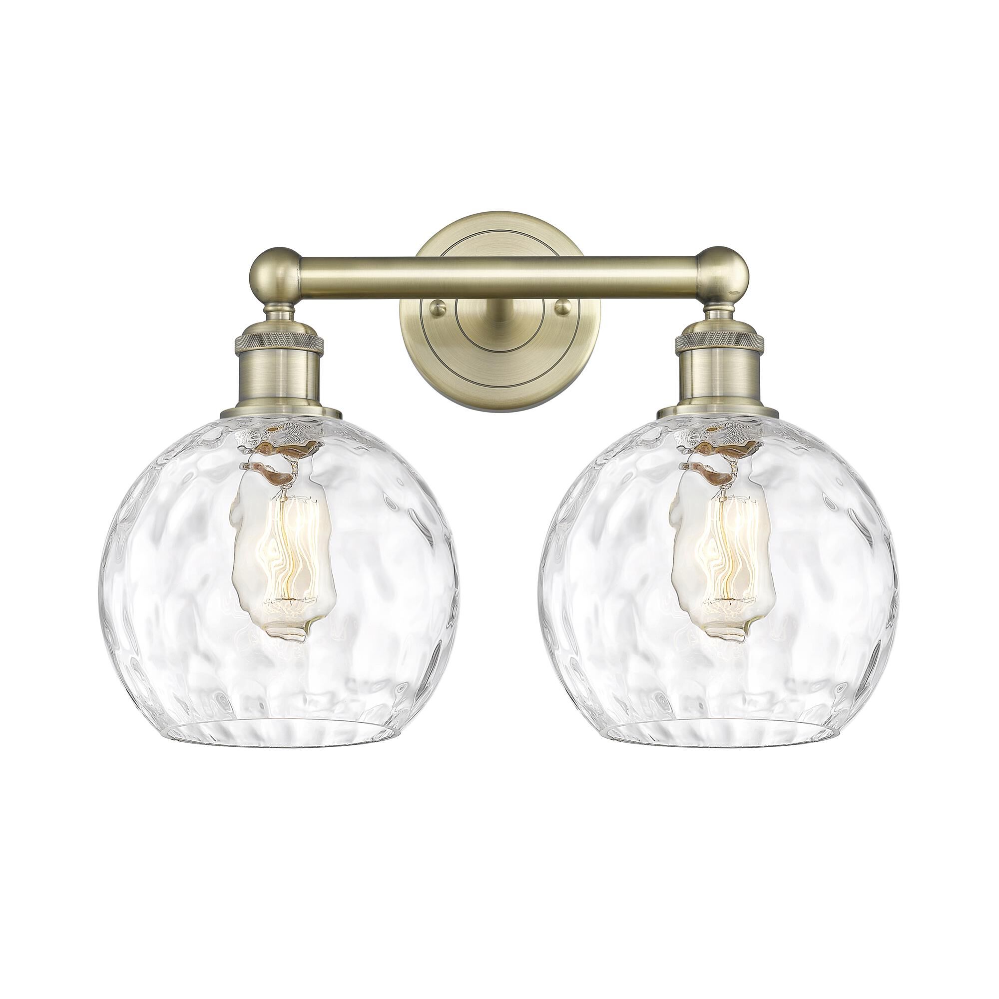 Shown in Antique Brass finish and Clear glass