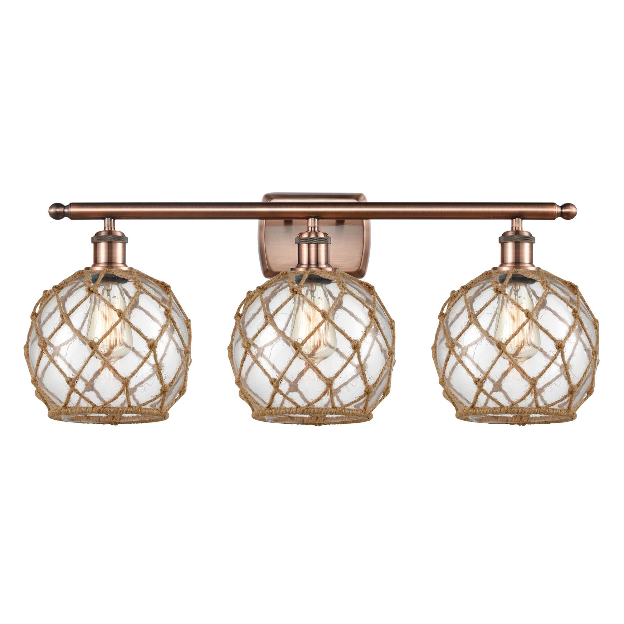 Shown in Antique Copper finish and Sphere glass and Glass And Rope shade
