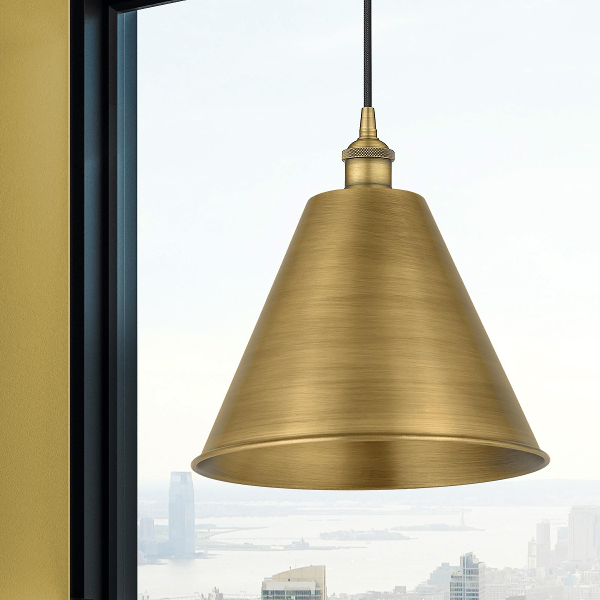Shown in Brushed Brass finish and Matte Black Edison Cone shade