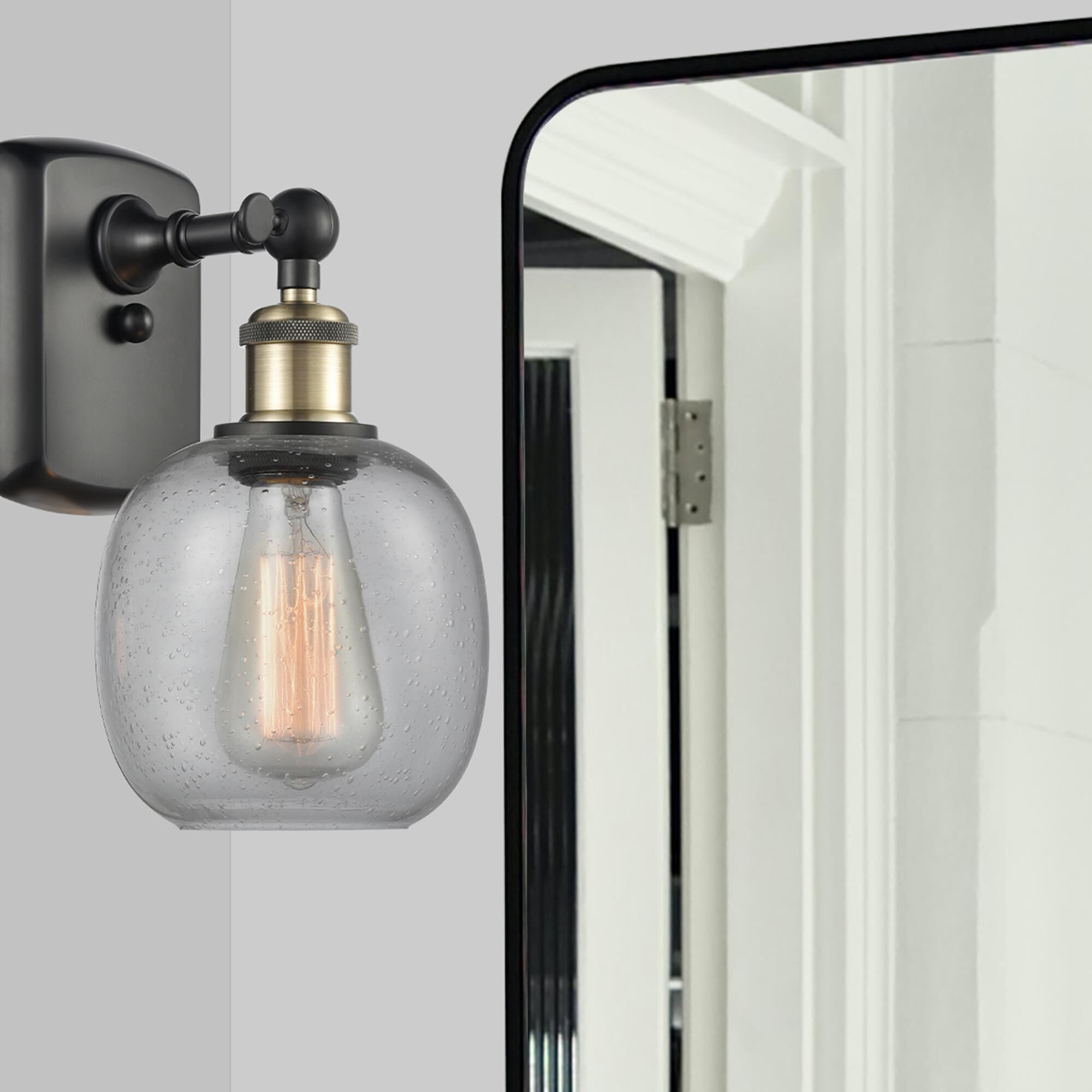 Shown in Black Antique Brass finish and Sphere glass and Glass shade