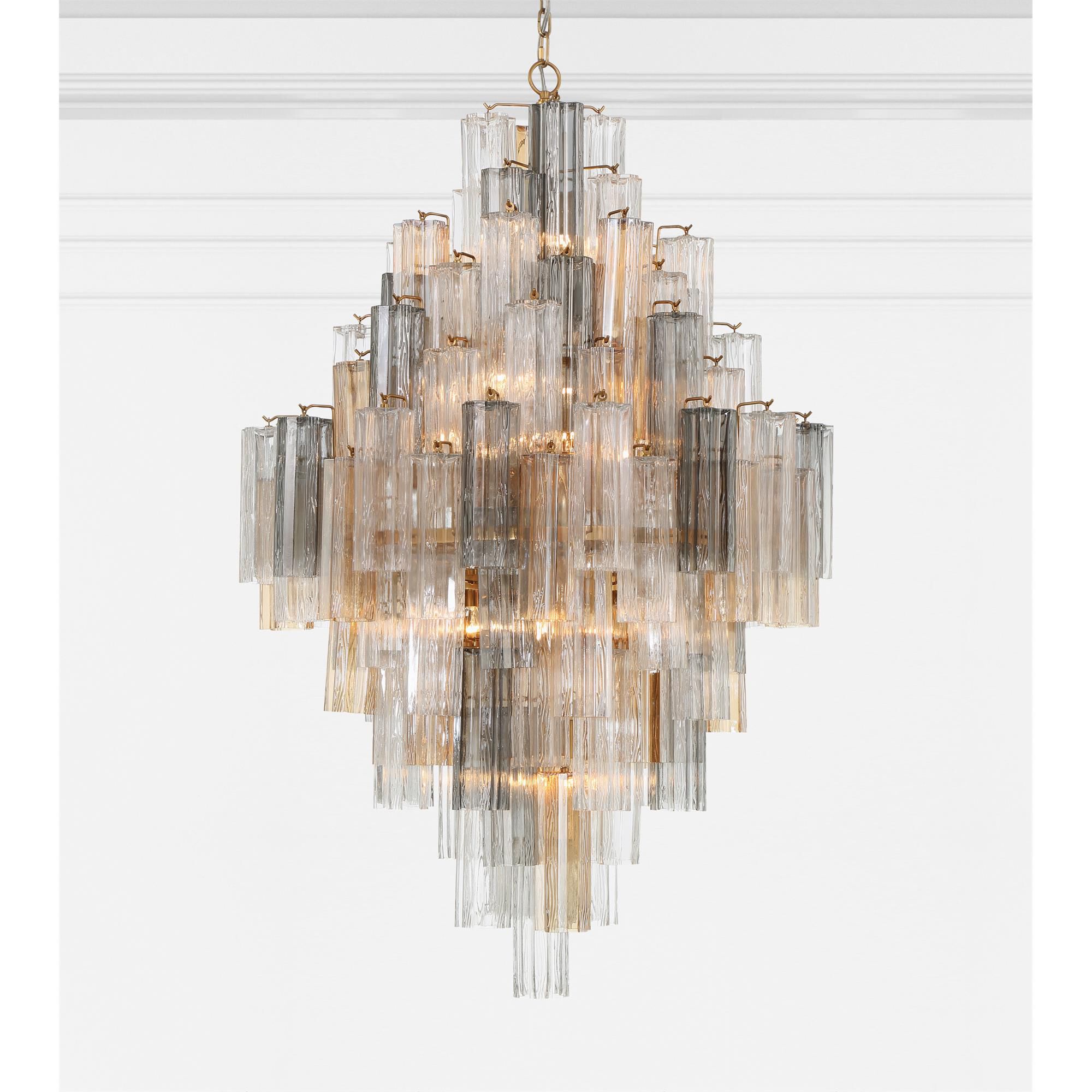 Shown in Aged Brass finish and Tronchi Glass Autumn crystal