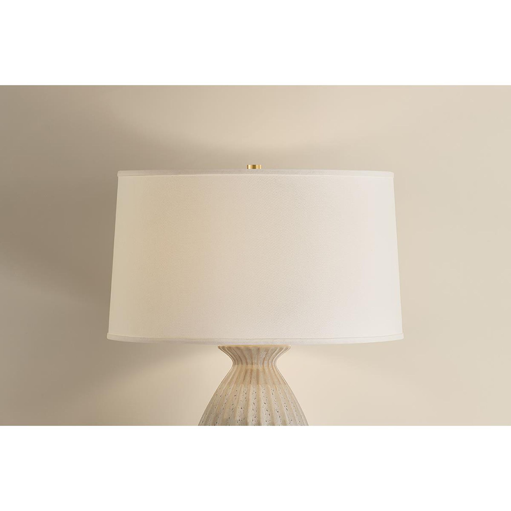 Shown in Aged Brass and Ceramic Taupe Velvet finish and White Linen shade