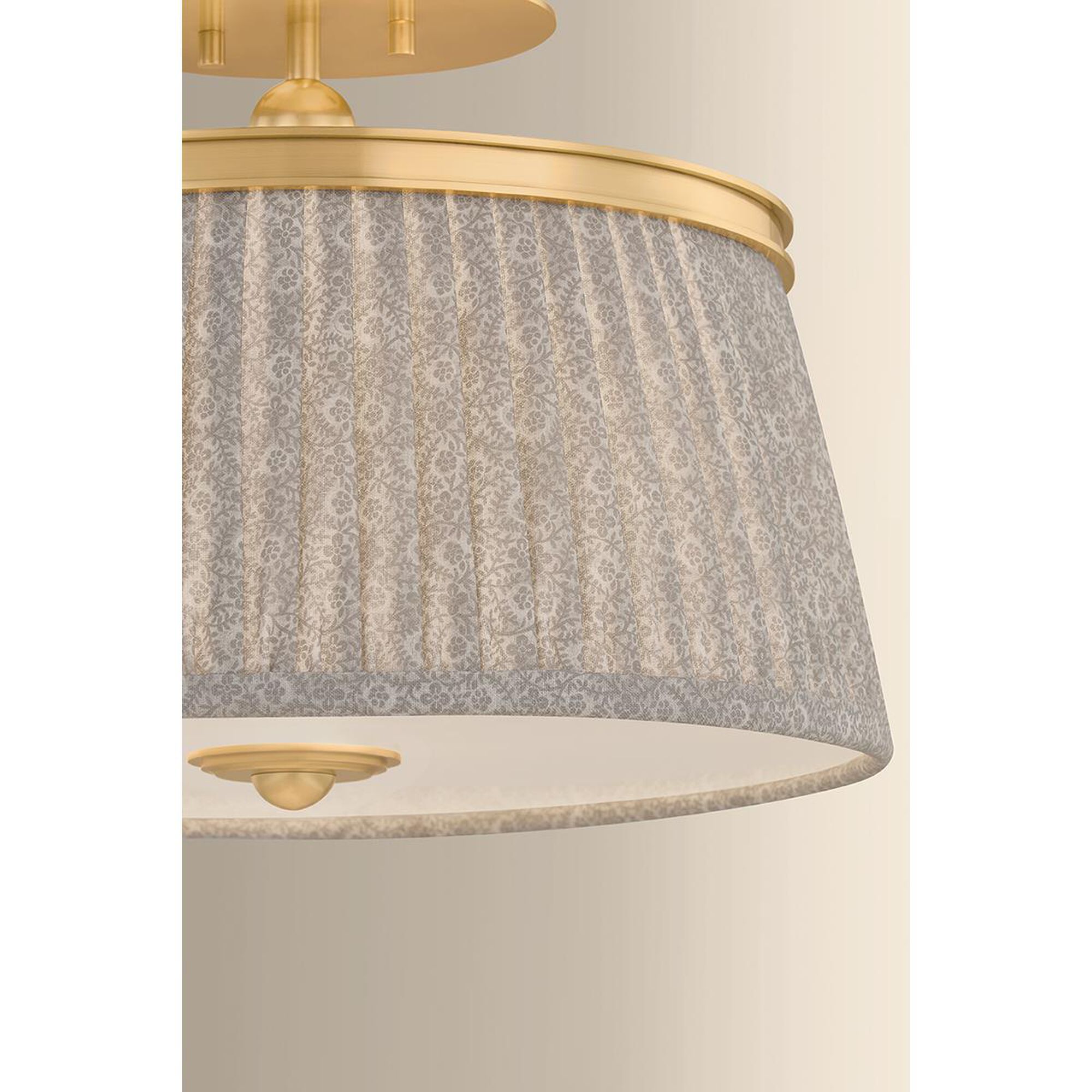 Shown in Aged Brass finish and Gathered Printed Cotton shade