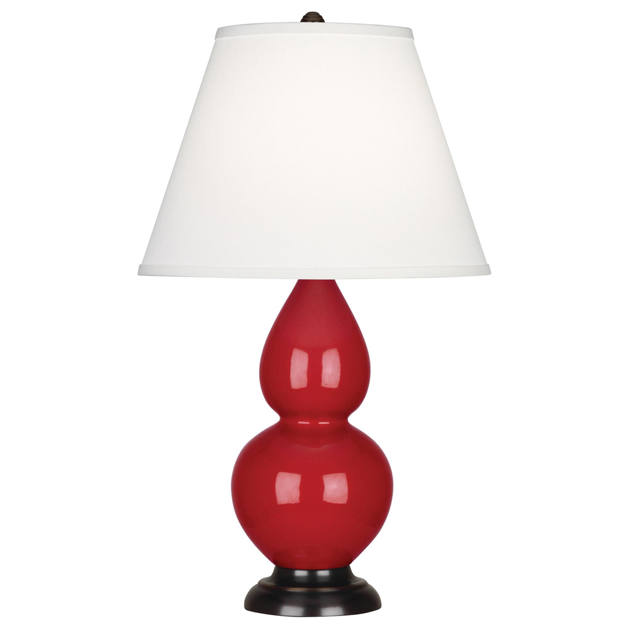 Shown in Ruby Red Glazed Ceramic With Deep Patina Bronze ed Accents finish and Pearl Dupioni Fabric shade