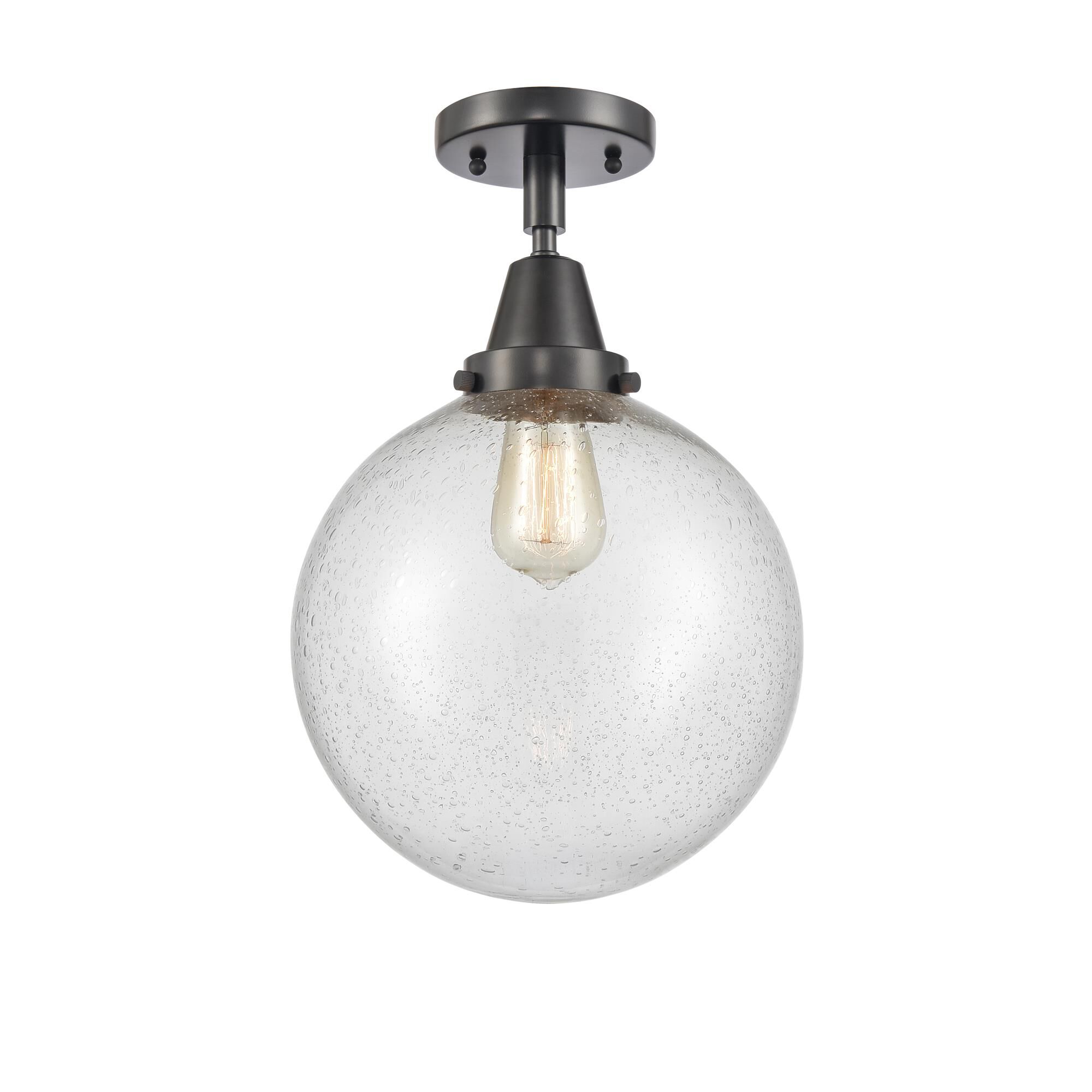 Shown in Matte Black finish and Seedy Beacon glass