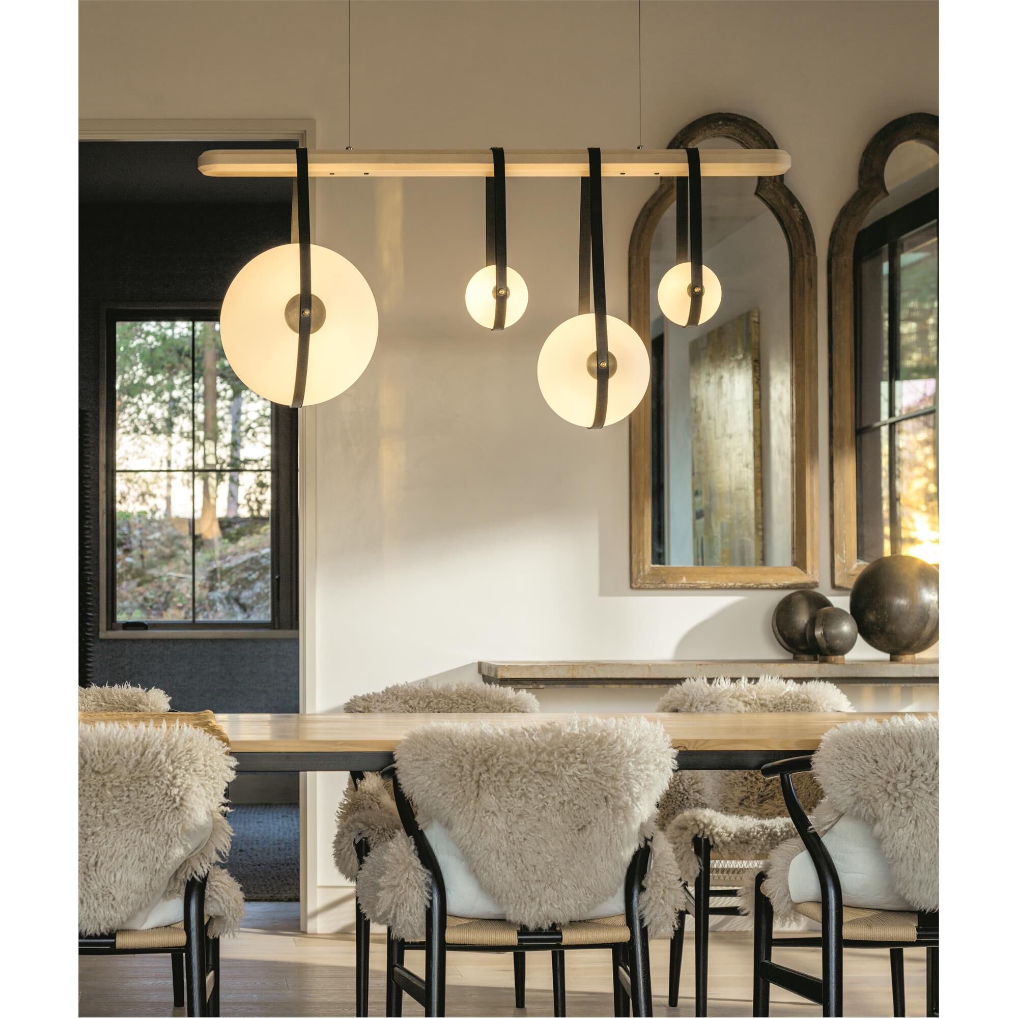 Shown in Black finish and Opal glass and Antique Brass accent