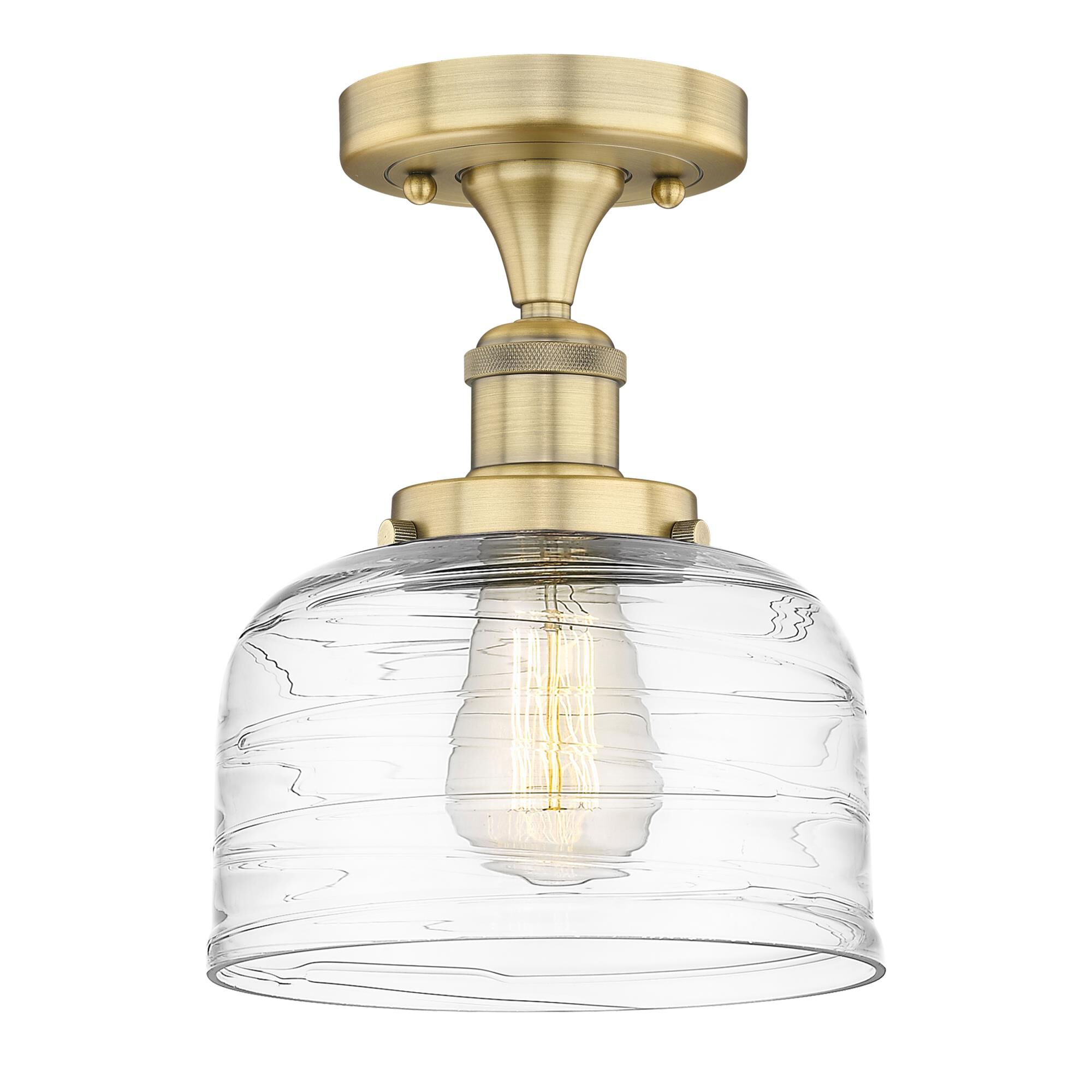 Shown in Brushed Brass finish and Clear Deco Swirl glass