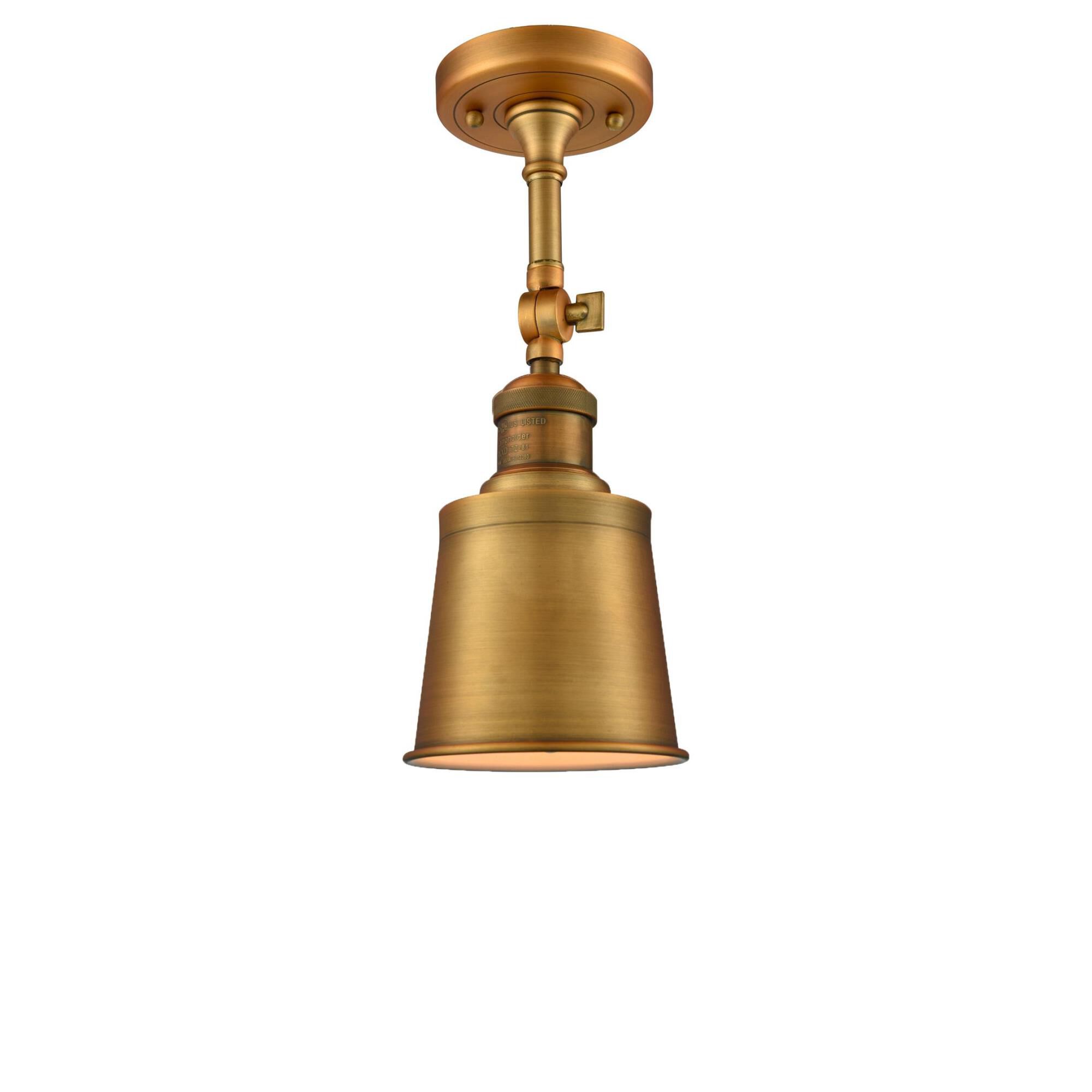 Shown in Brushed Brass finish and Brushed Brass shade