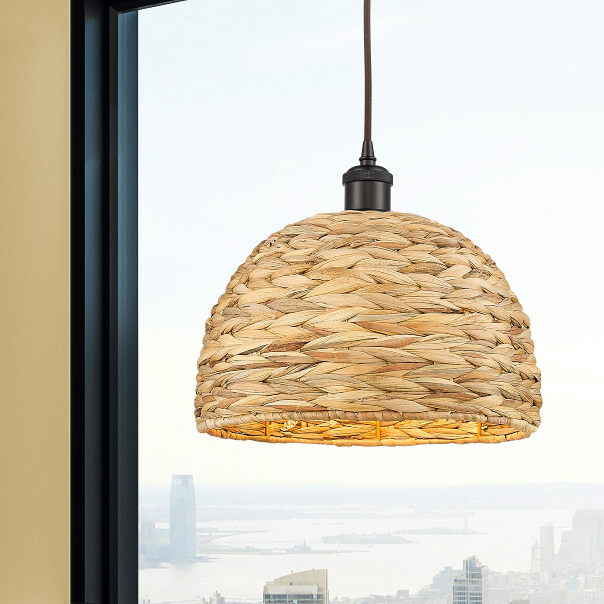 Shown in Oiled Brass finish and Natural Rattan Rattan shade