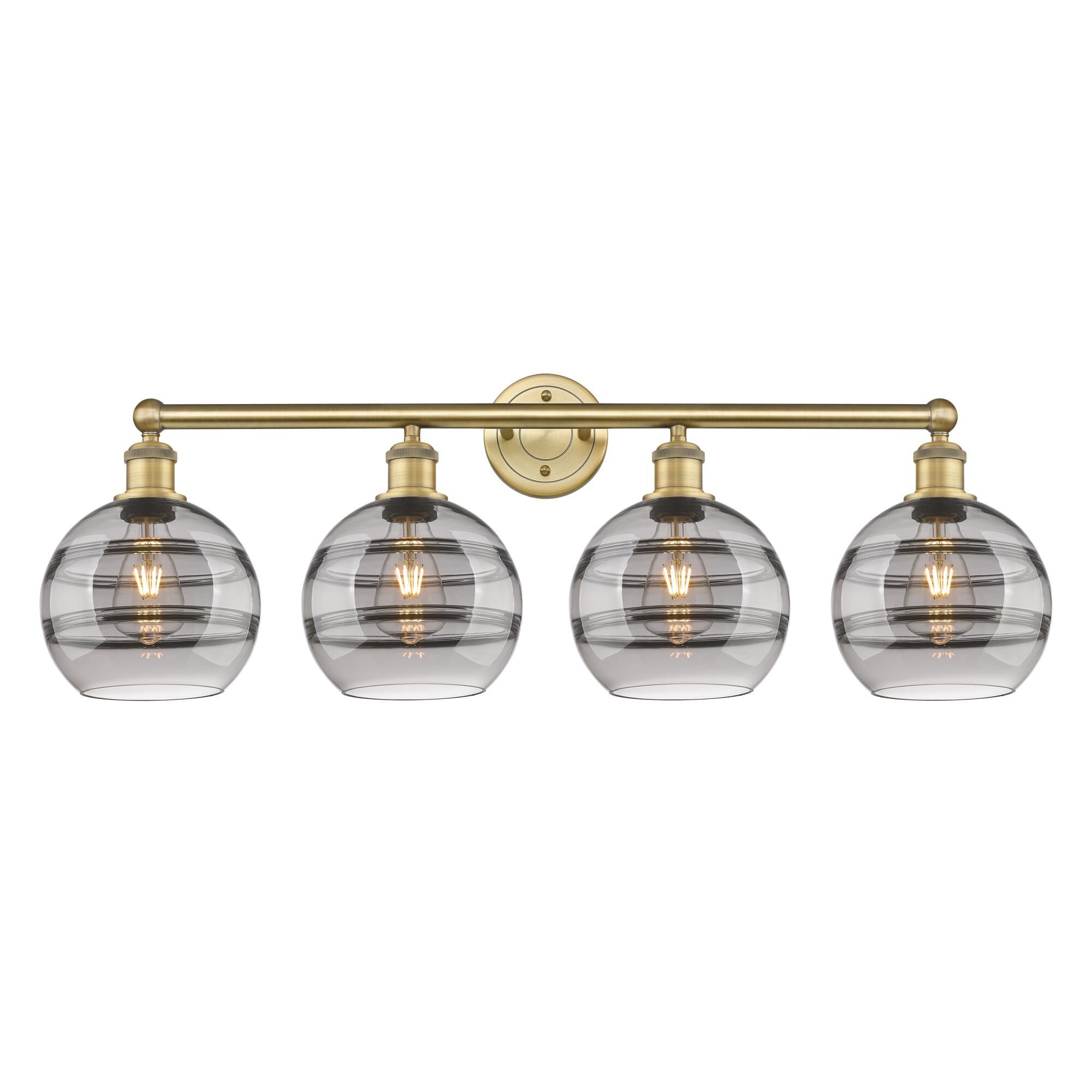 Shown in Brushed Brass finish and Light Smoke glass