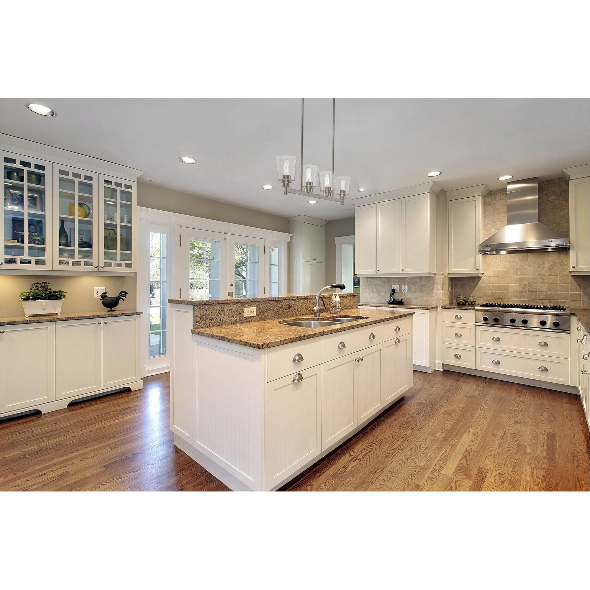 Shown in Brushed Nickel finish and Glass shade