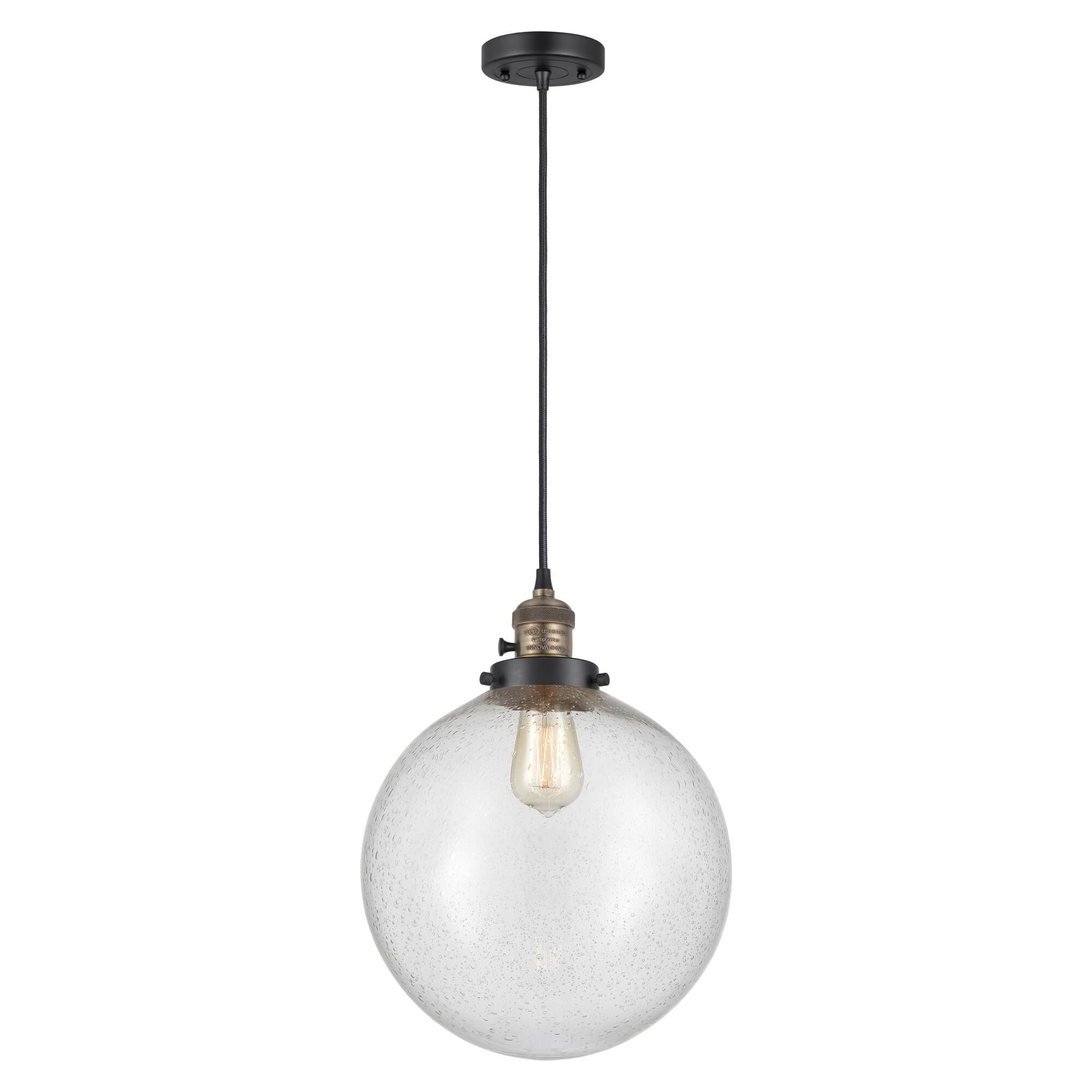 Shown in Black Antique Brass finish and Seedy glass