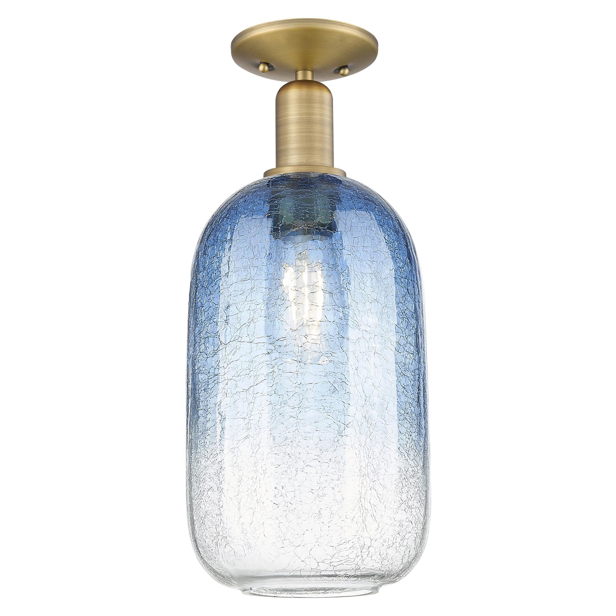 Shown in Brushed Brass finish and Sapphire Blue glass