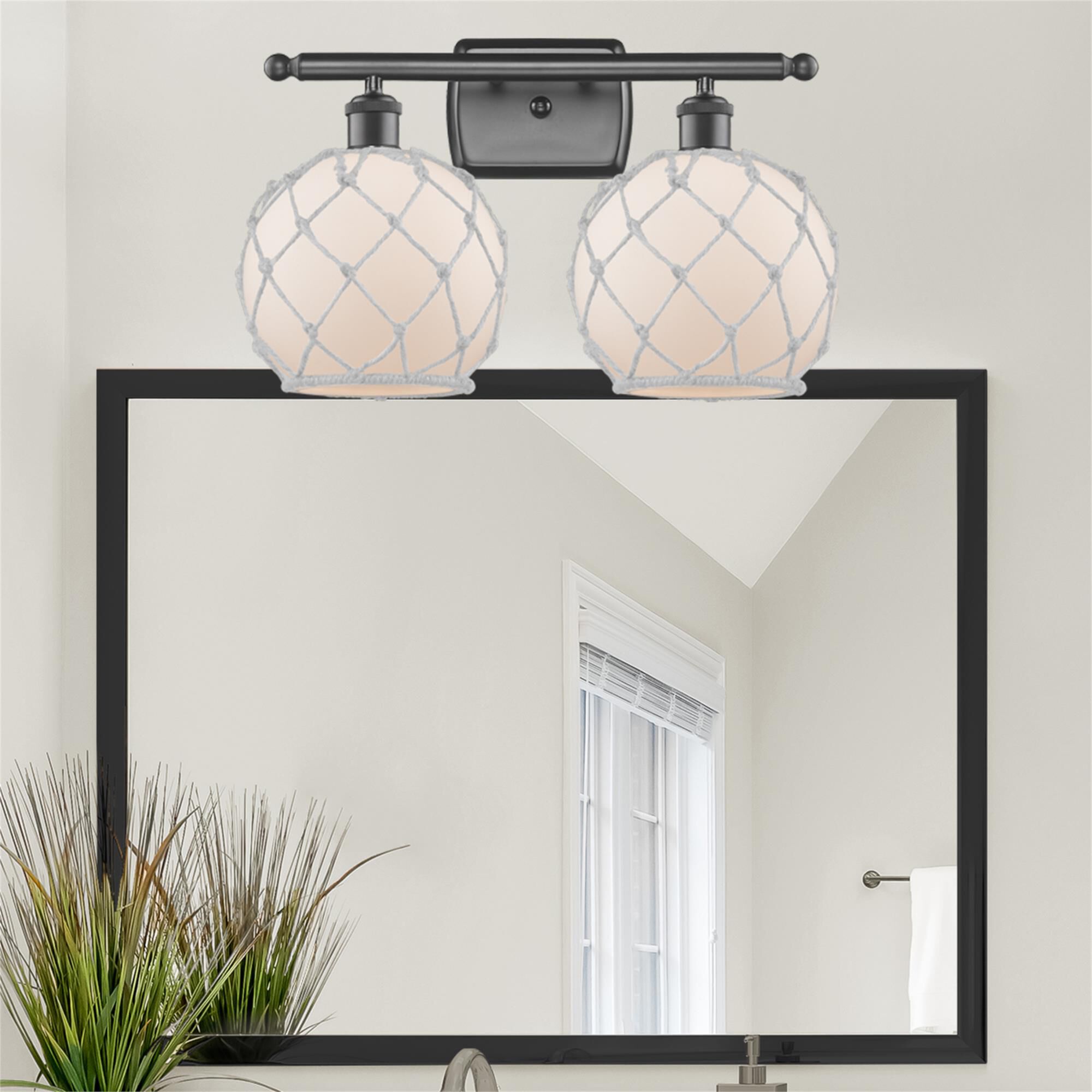 Shown in Oil Rubbed Bronze finish and White glass and White Rope accent