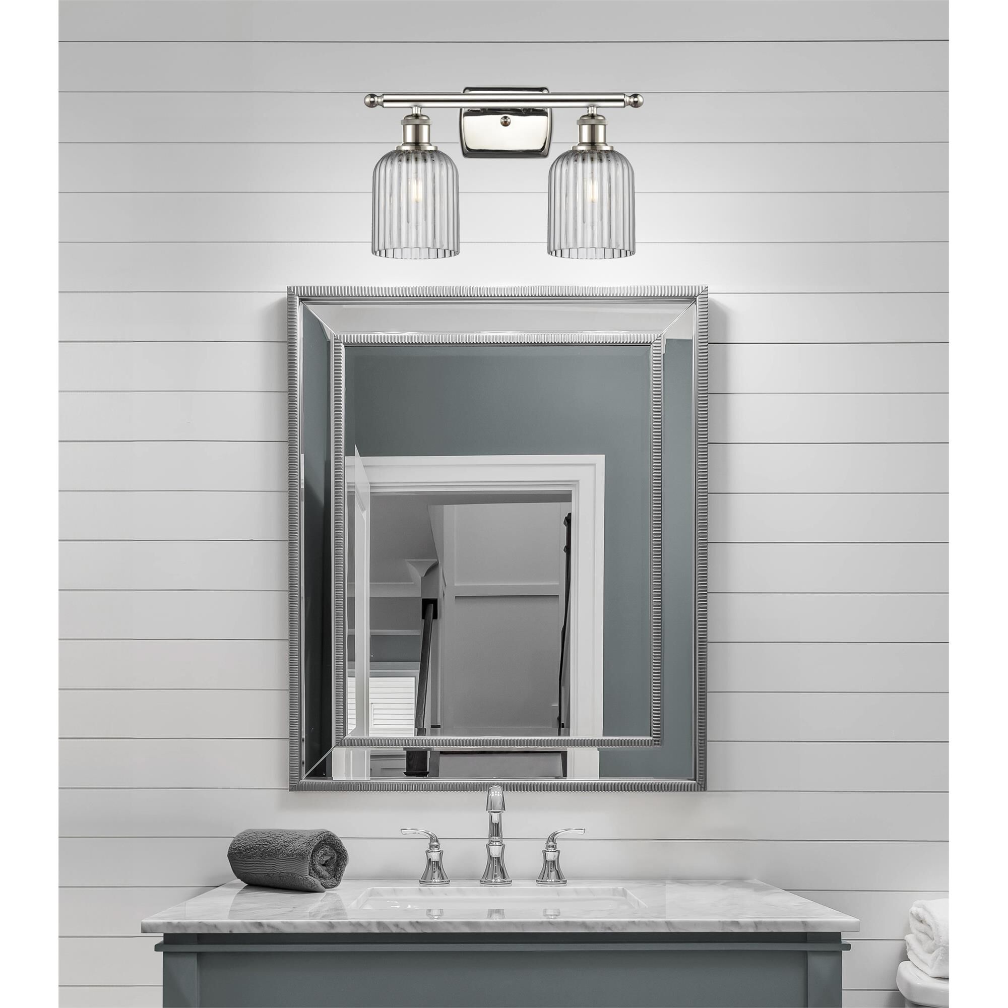Shown in Polished Nickel finish and Light Smoke glass