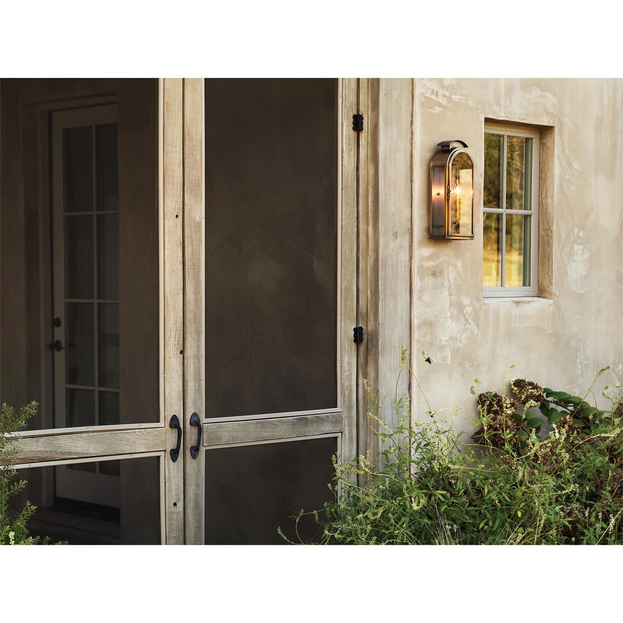 Shown in Light Antique Brass finish and Clear glass