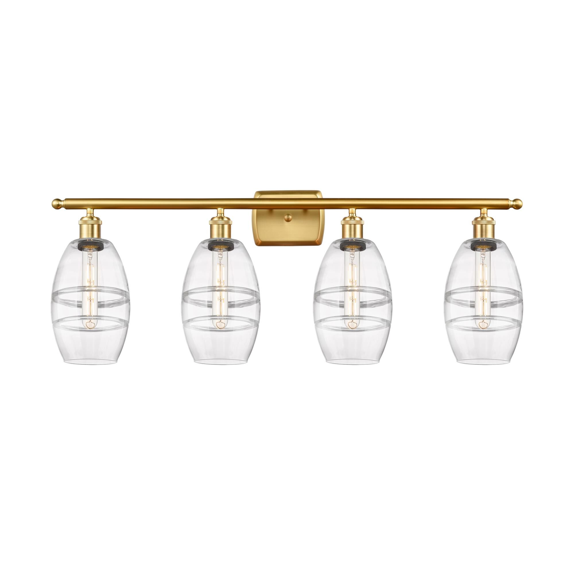 Shown in Satin Gold finish and Clear glass