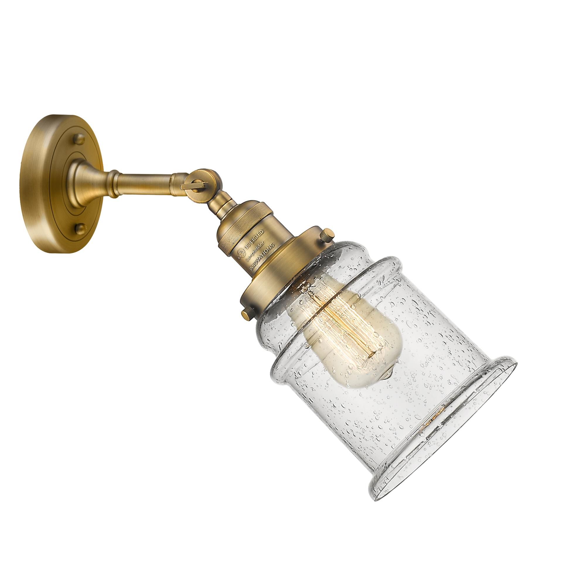 Shown in Brushed Brass finish and Seedy glass and None accent