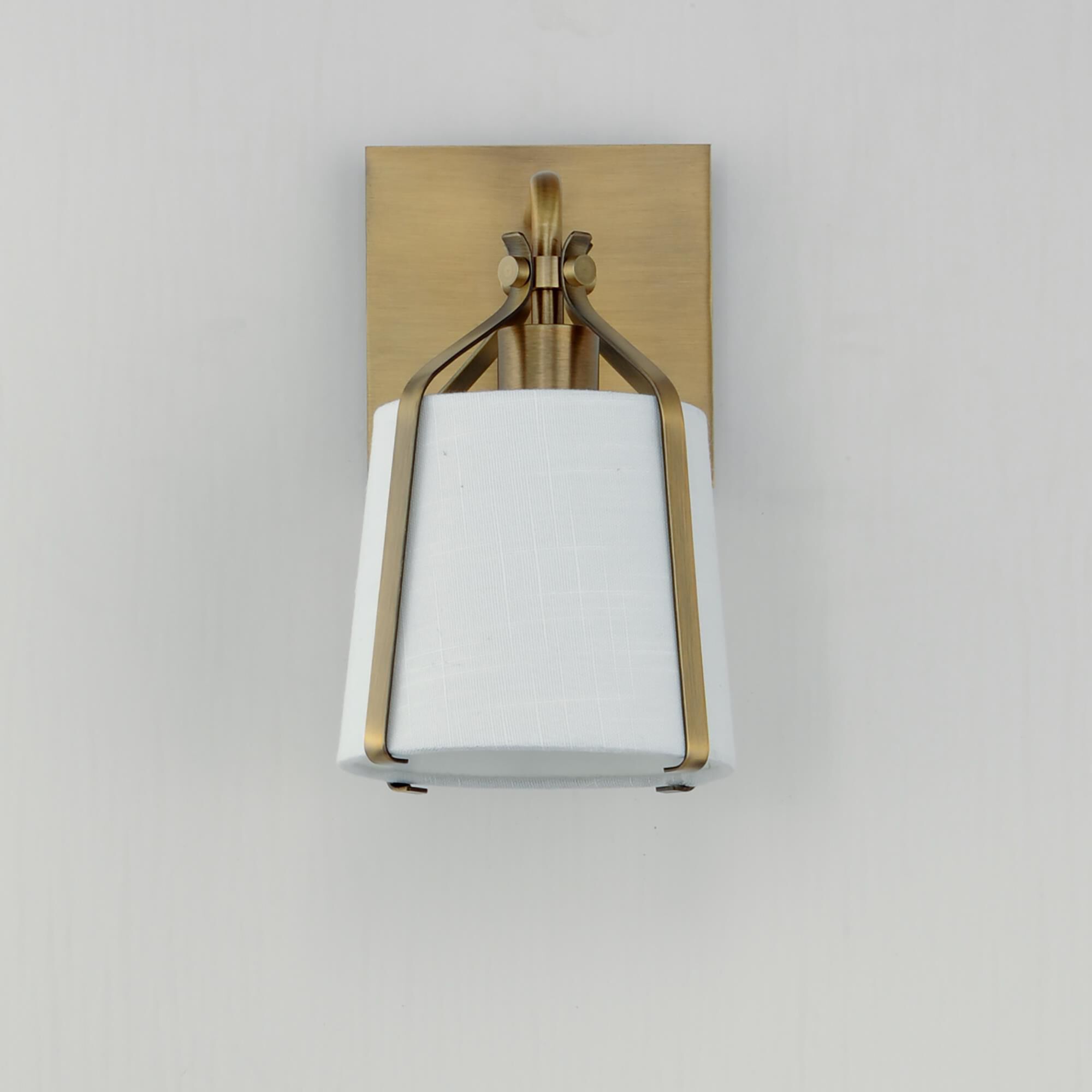 Shown in Natural Aged Brass finish and Cloth shade