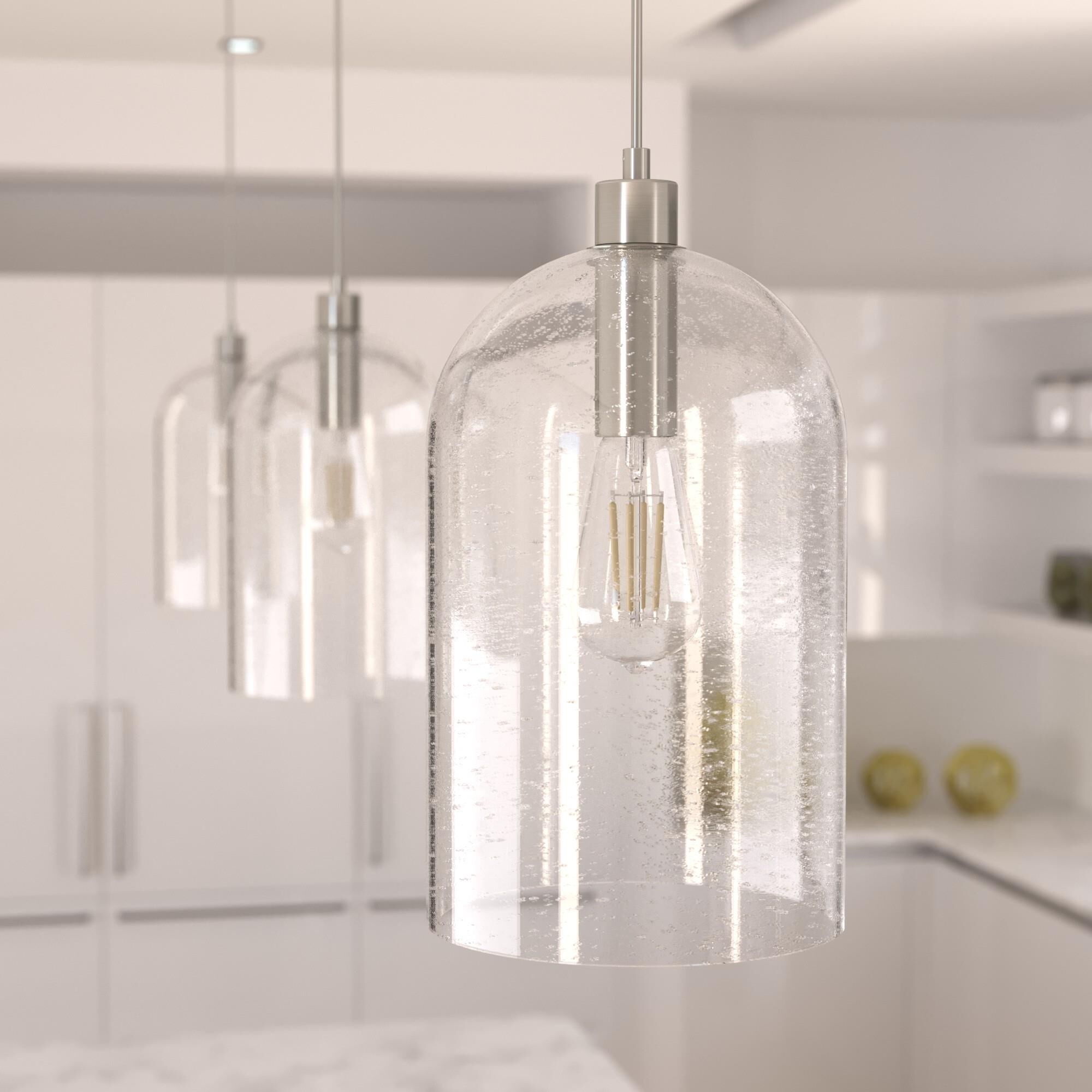 Shown in Brushed Nickel finish and Clear Seeded glass