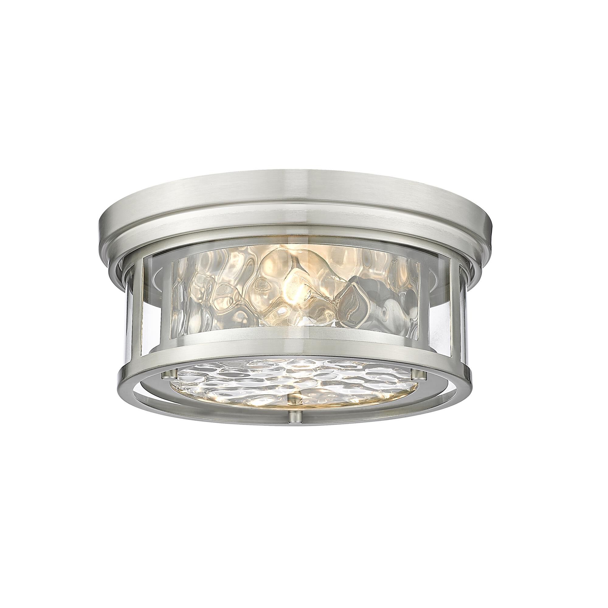 Shown in Brushed Nickel finish and Glass shade