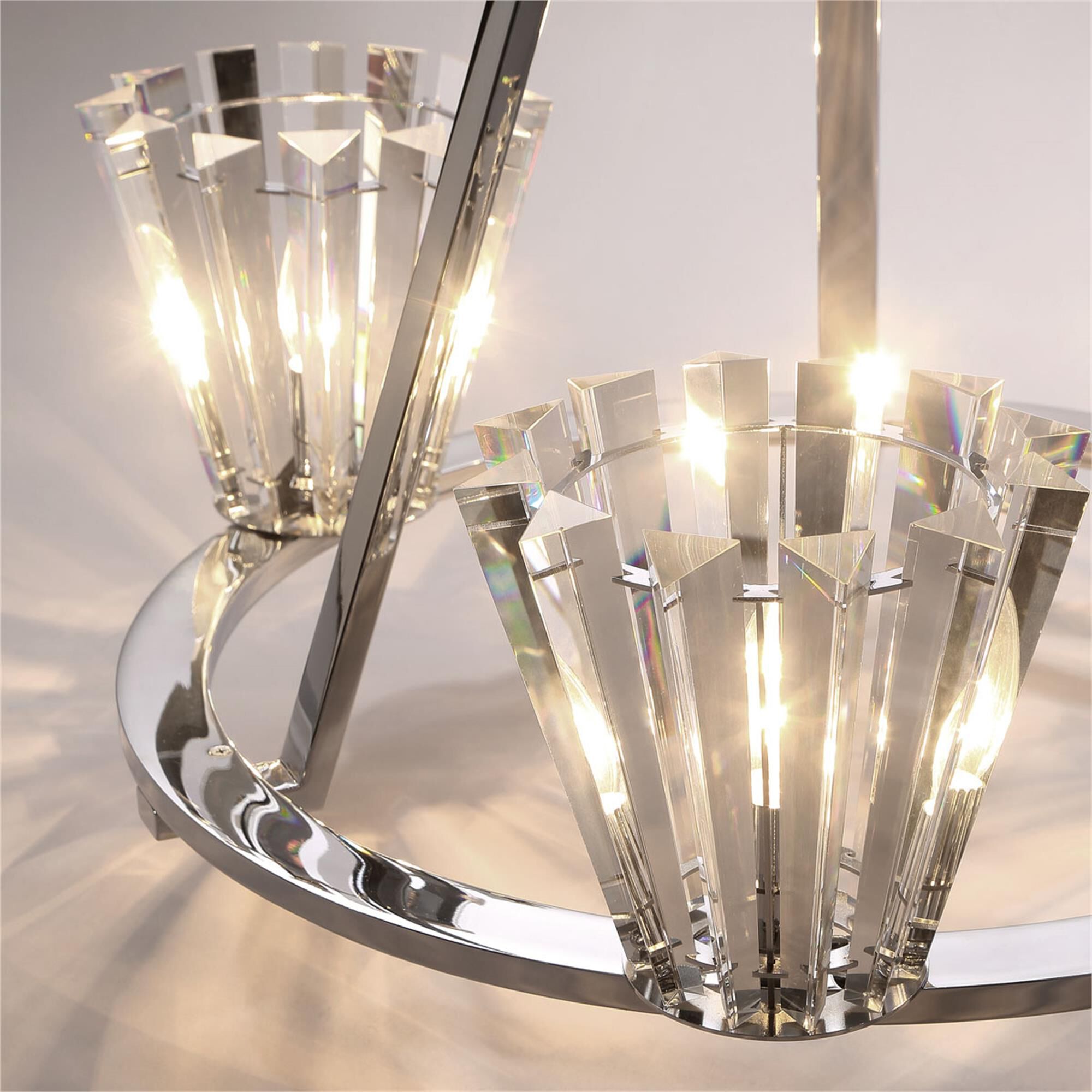 Shown in Chrome finish and Optic crystal and Crystal Prisms glass