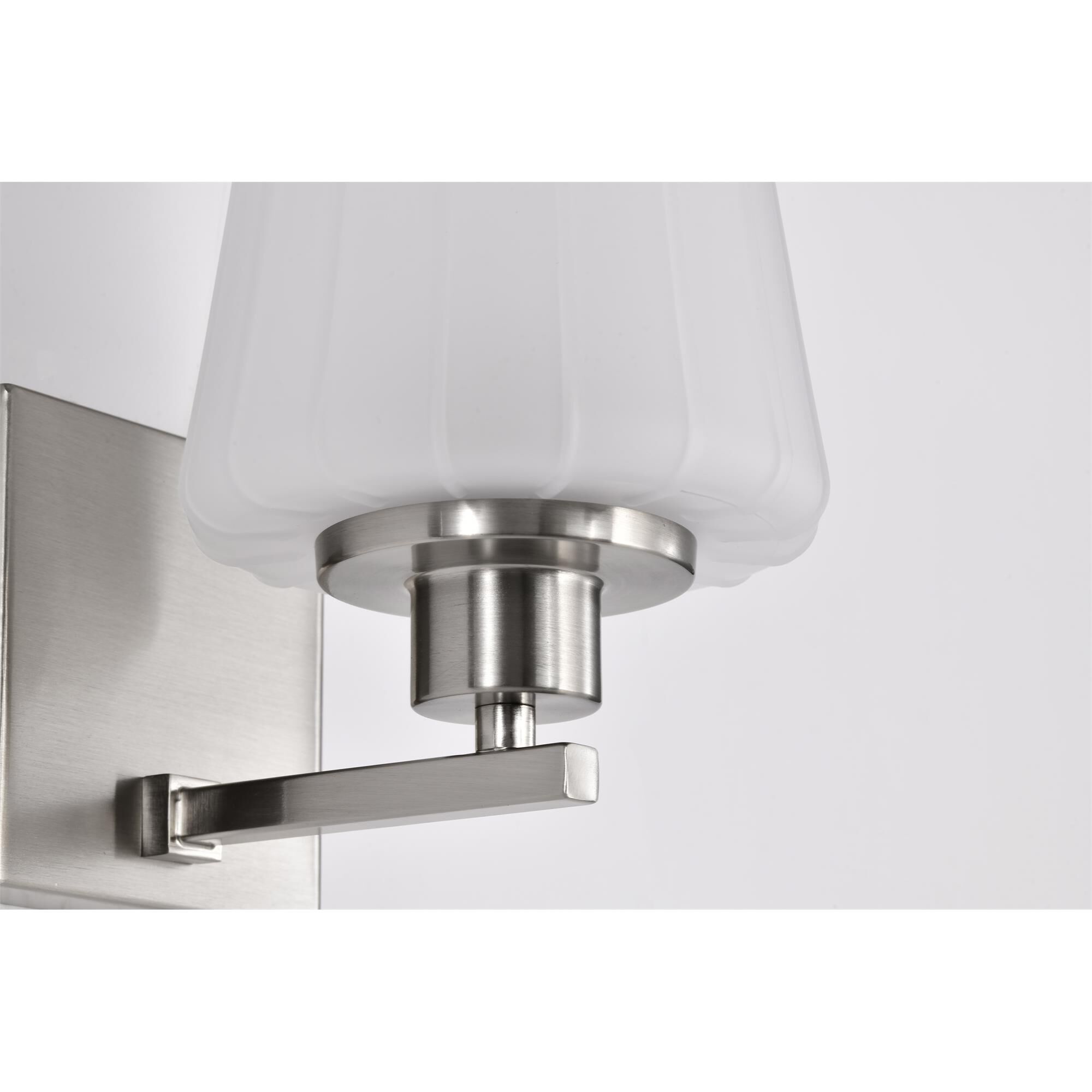Shown in Brushed Nickel finish and Etched White glass
