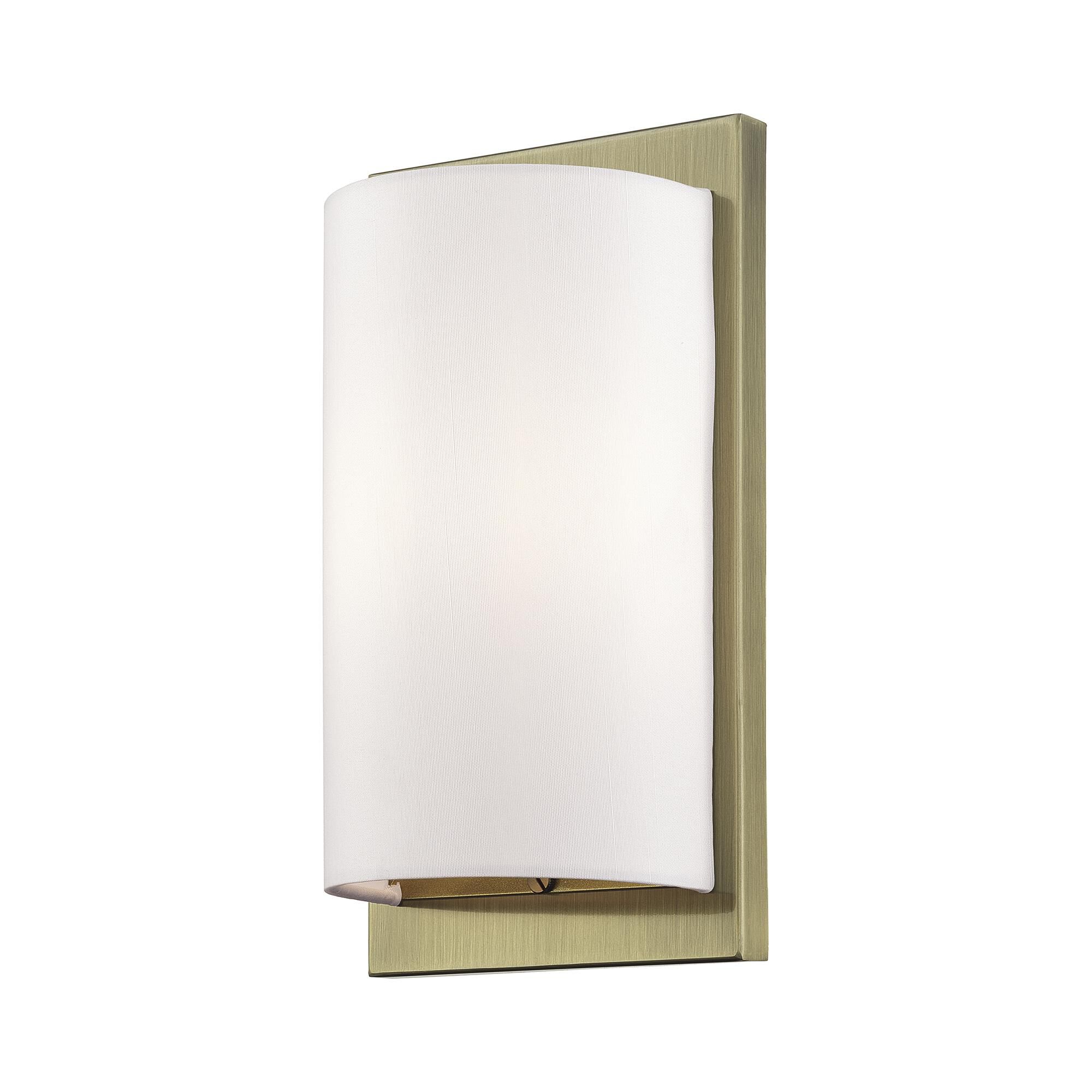 Shown in Antique Brass finish and Hand Crafted Off-White Fabric Hardback shade