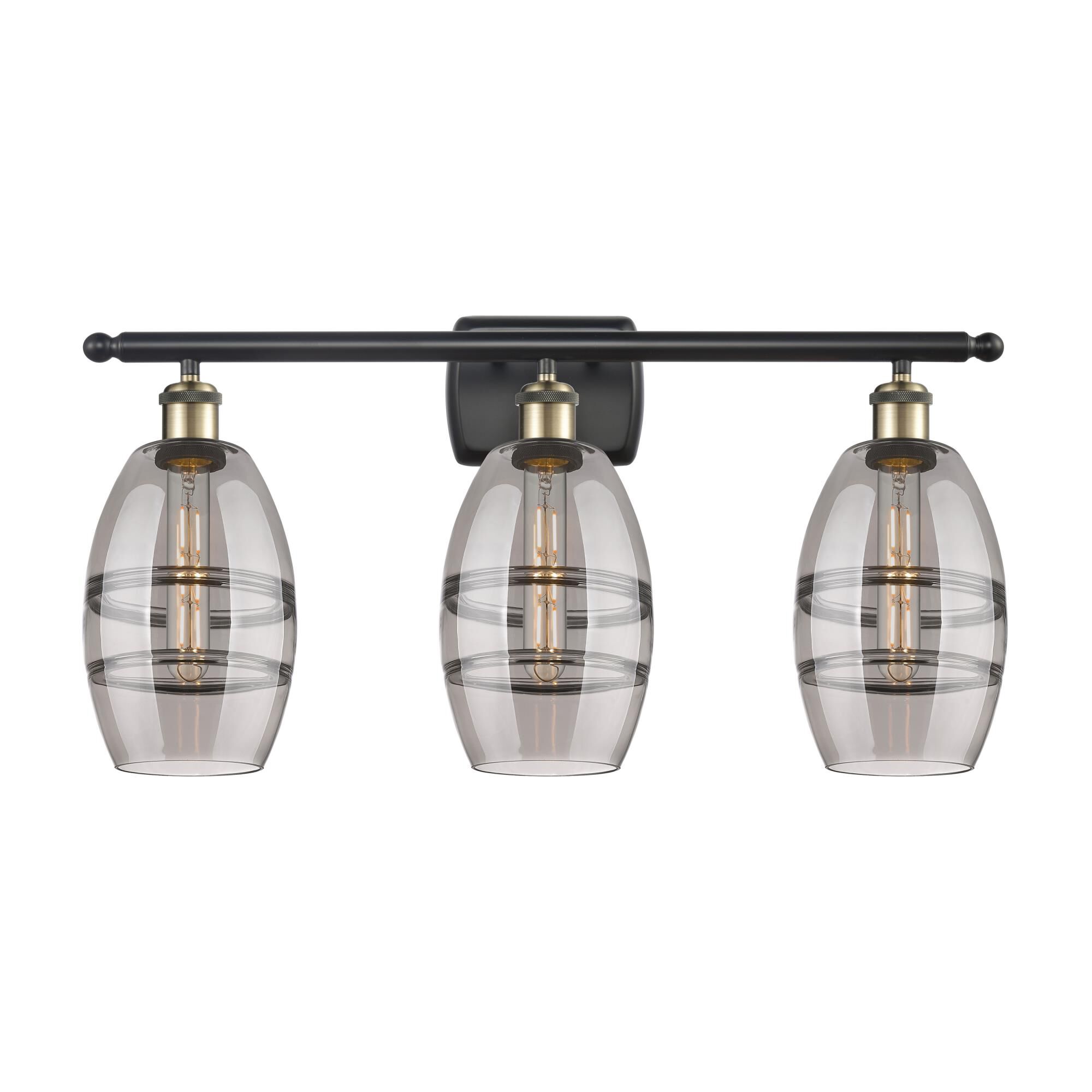 Shown in Black Antique Brass finish and Light Smoke glass