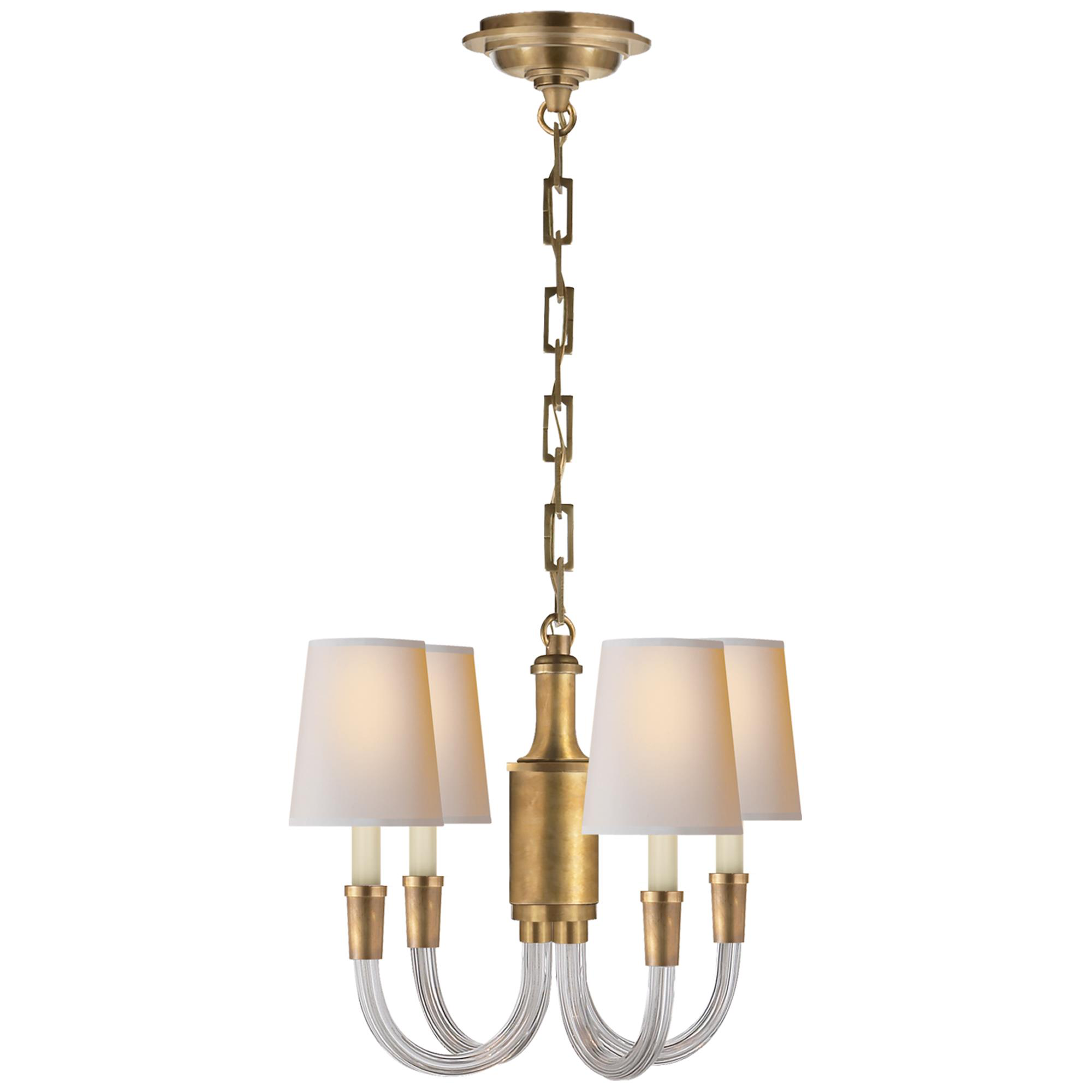Shown in Crystal With Brass finish and Natural Paper shade 