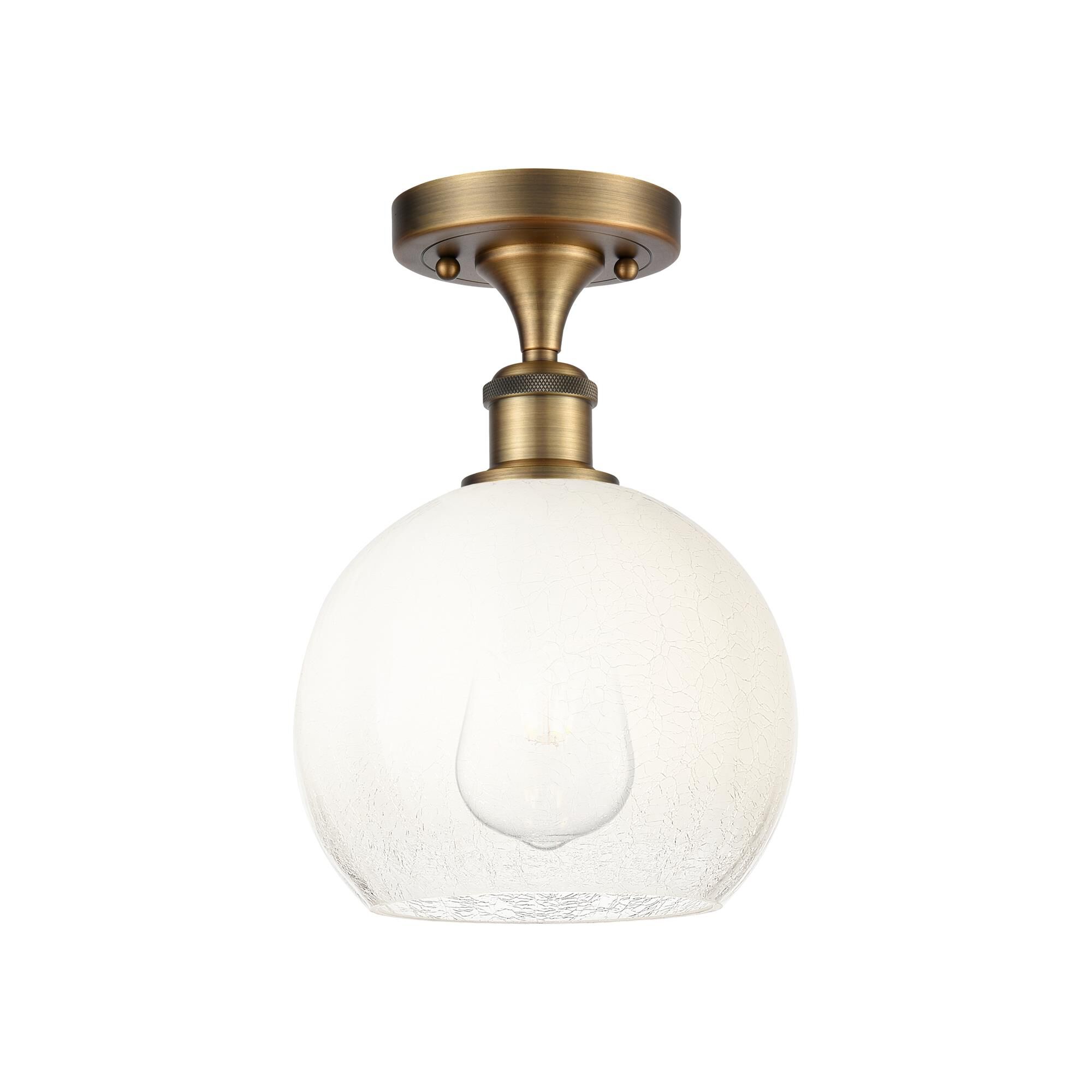 Shown in Brushed Brass finish and Opal glass