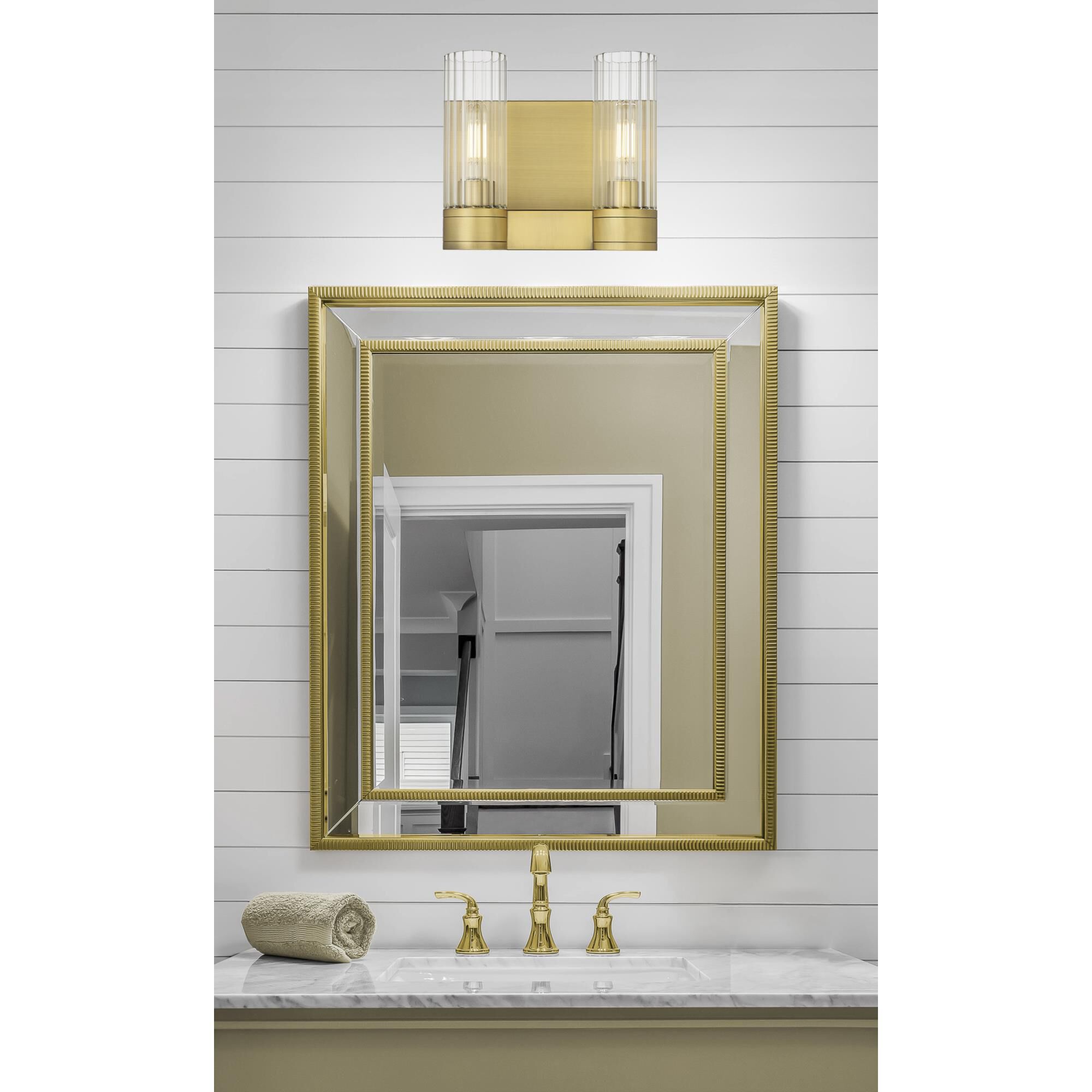 Shown in Brushed Brass finish and Clear glass