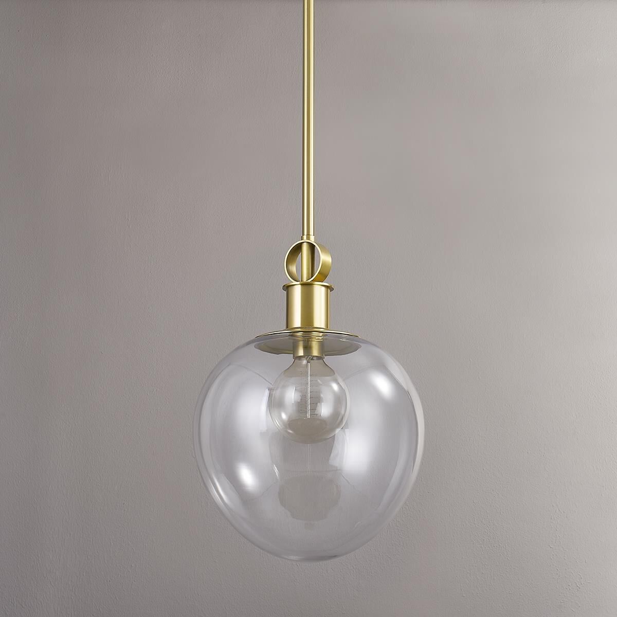 Shown in Aged Brass finish and Clear glass