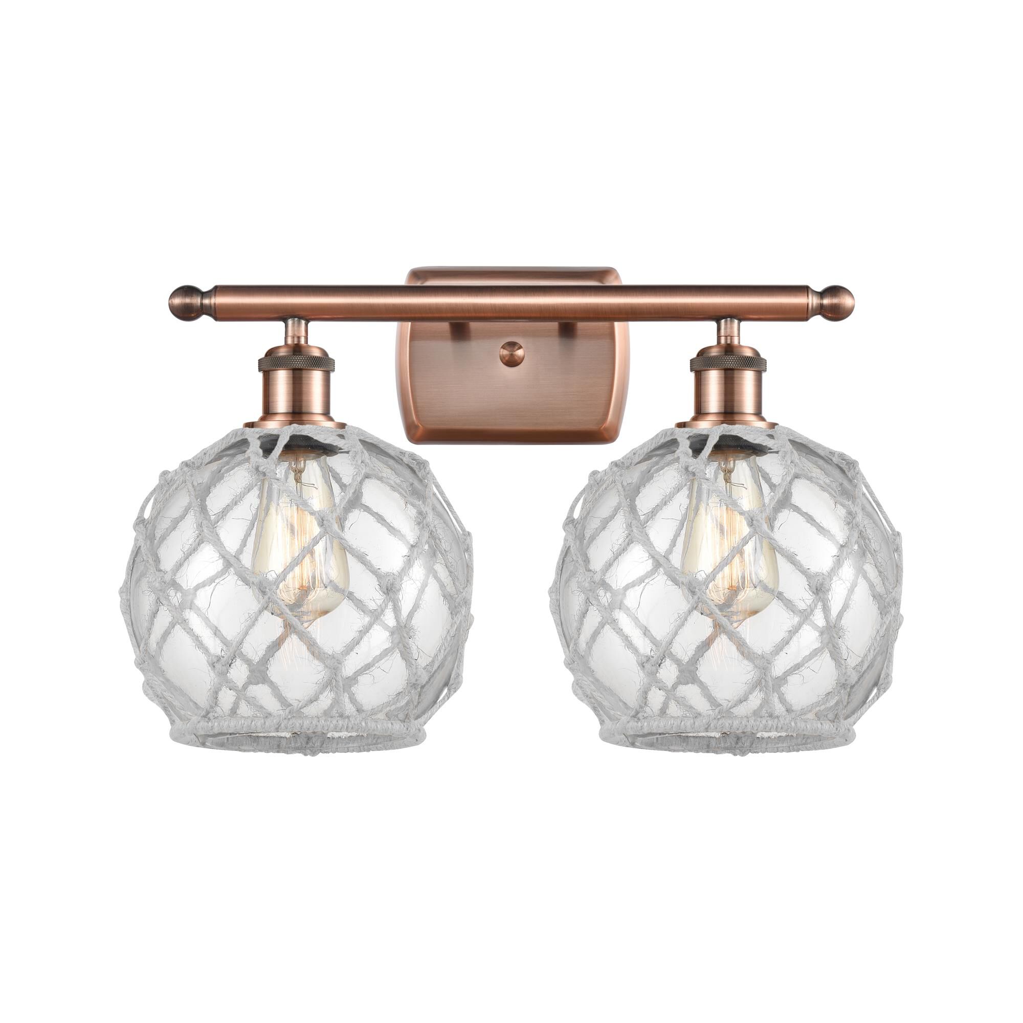 Shown in Antique Copper finish and Sphere glass and Glass And Rope shade