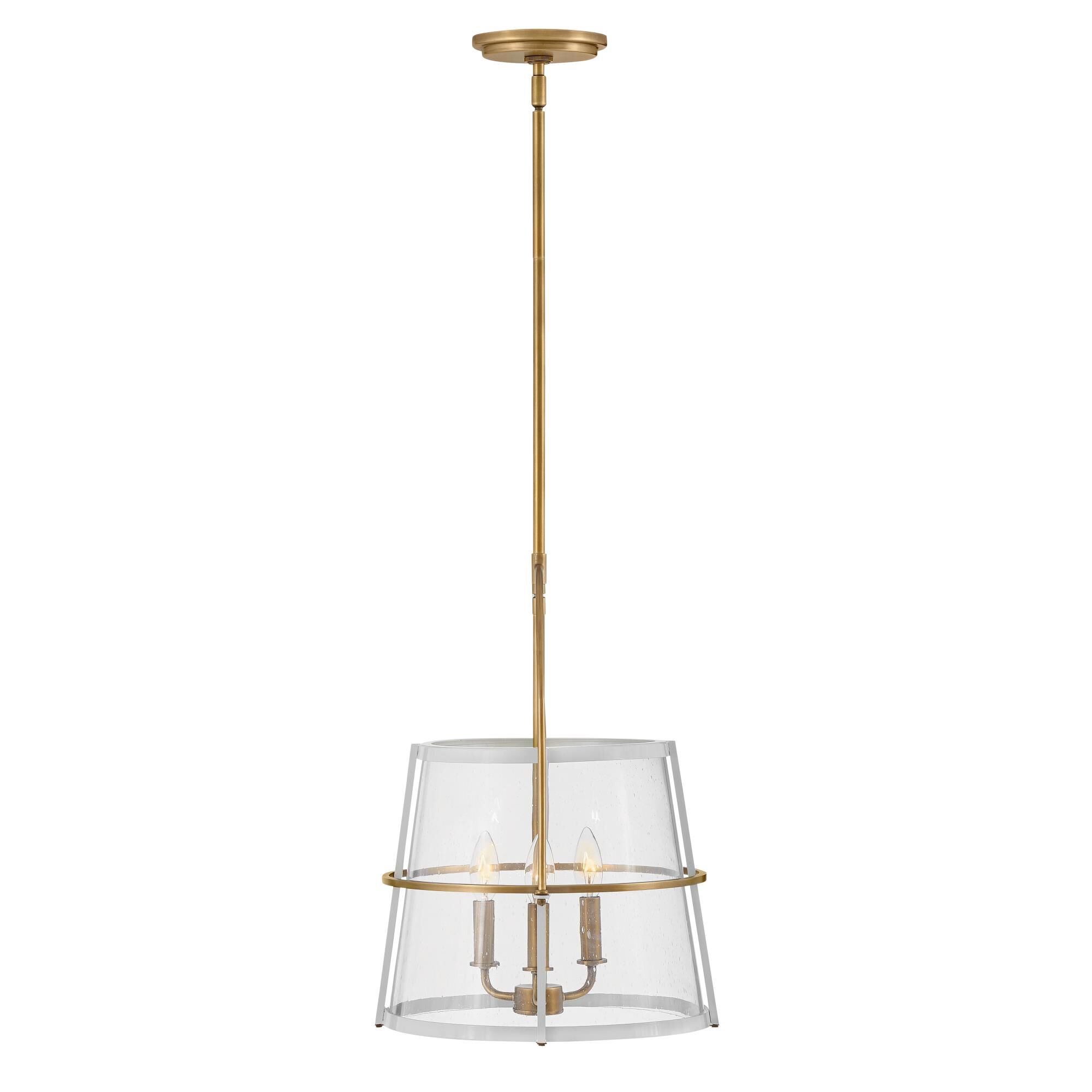 Shown in Heritage Brass with Polished White Accents finish and Clear Seedy glass