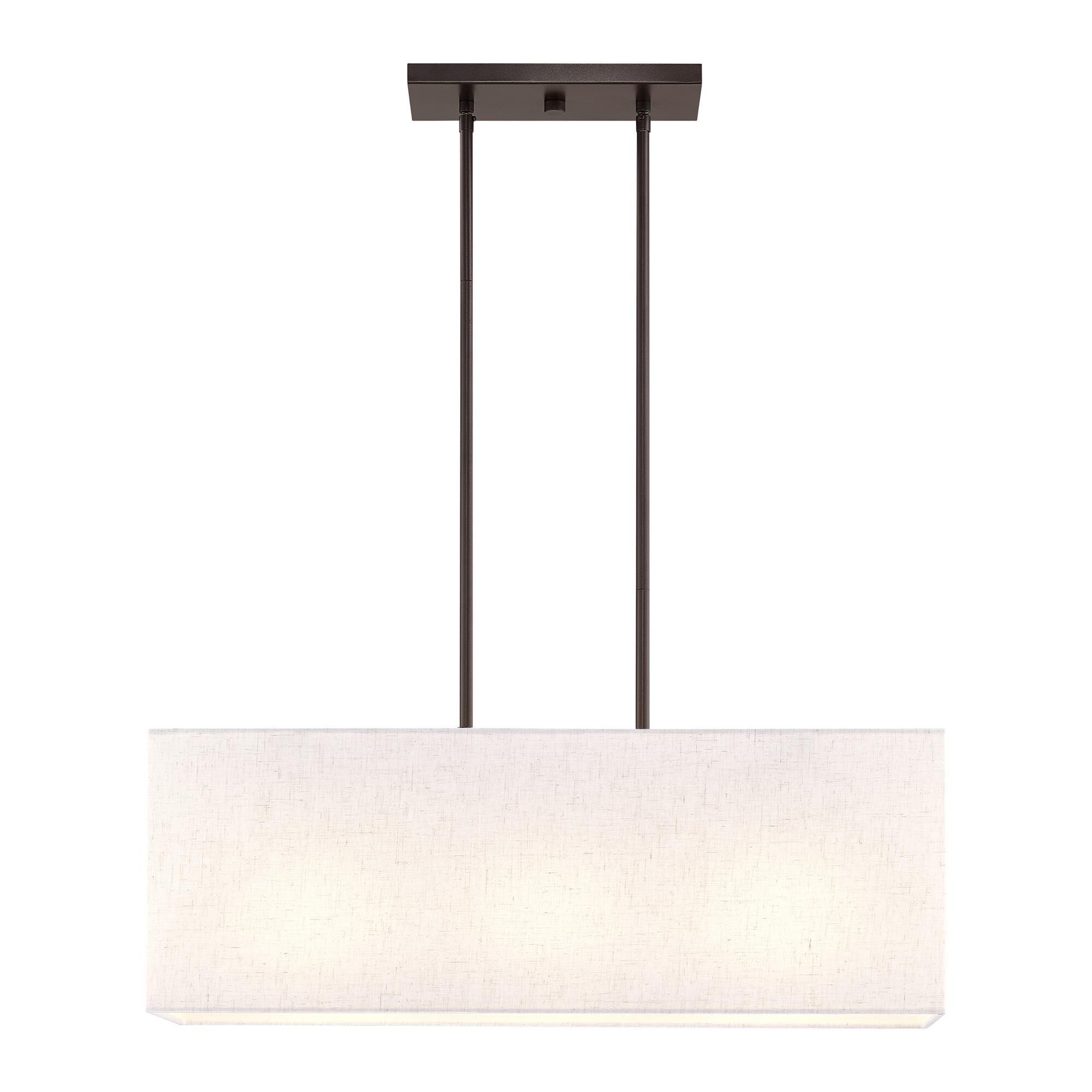 Shown in English Bronze finish and Hand Crafted Oatmeal Color Fabric Outside & White Fabric Inside Hardback shade