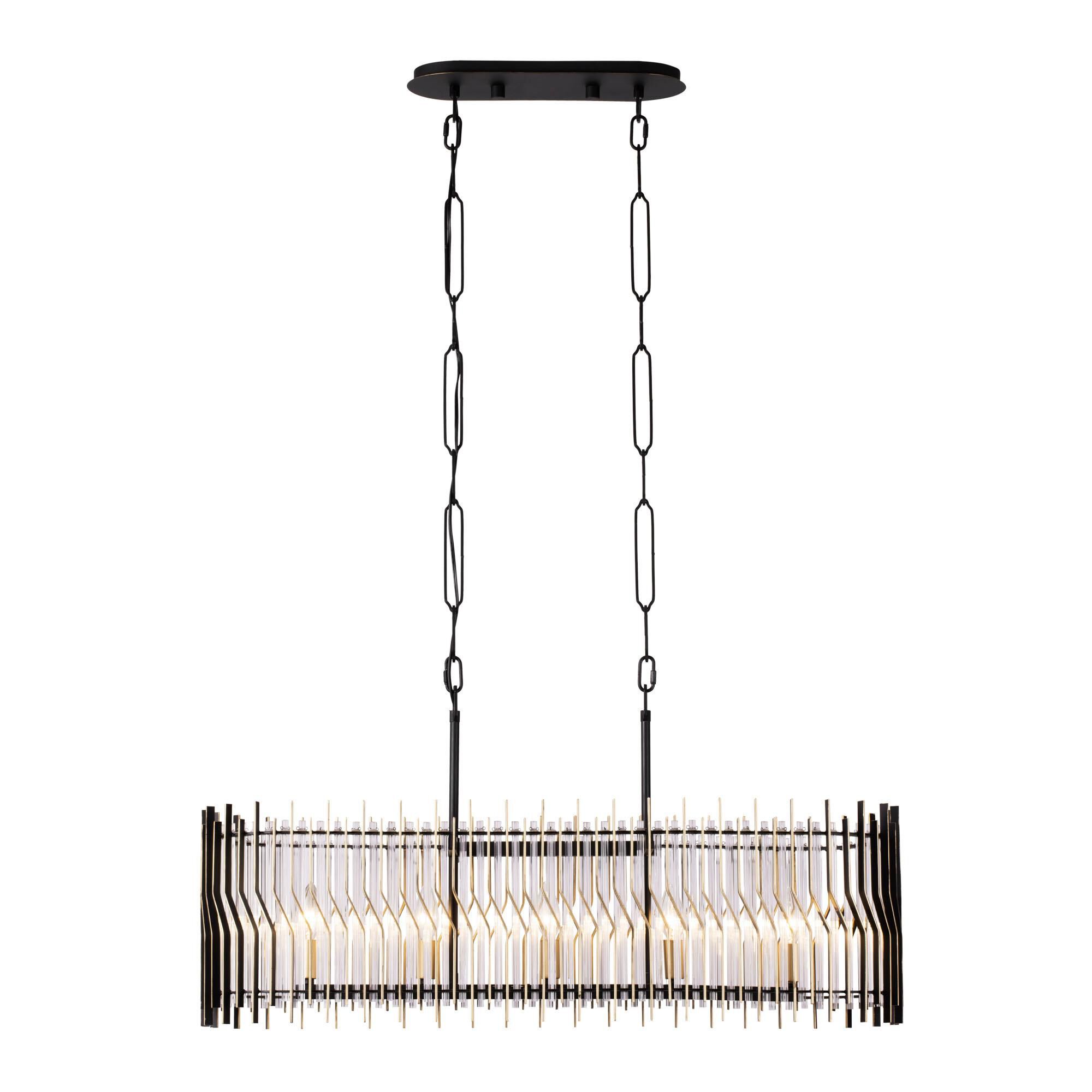 Shown in Matte Black/French Gold finish and Modern Clear Fluted shade